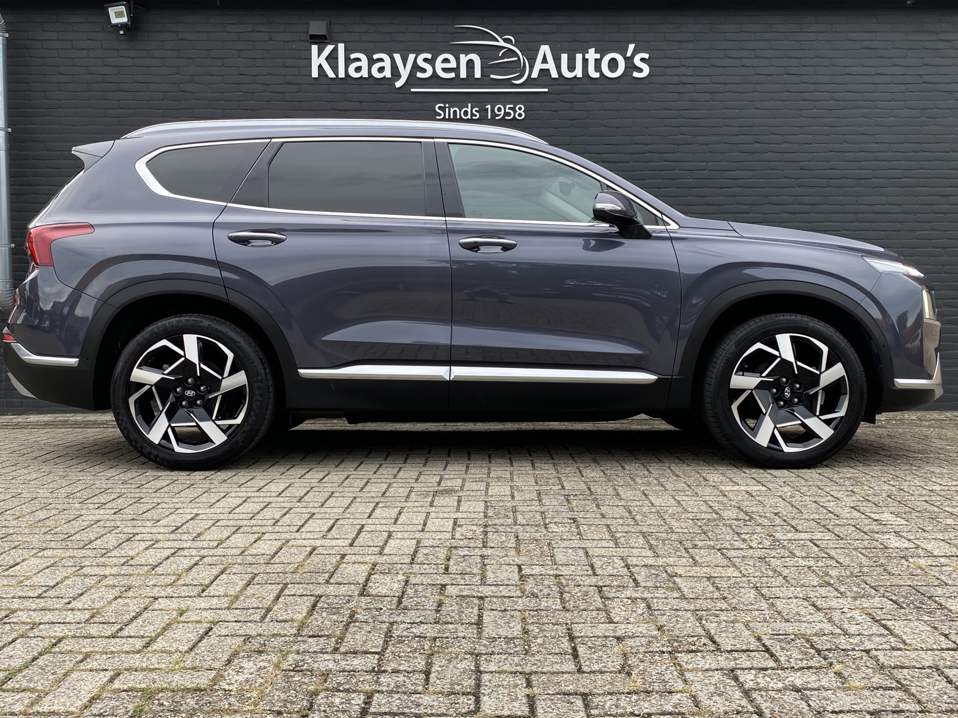 Hyundai Santa Fe 1.6 T-GDI HEV 230 pk Premium AUT. | dealer onderh. | leder inter. | 360 camera | trekhaak | memory | stoel-/stuurvw.