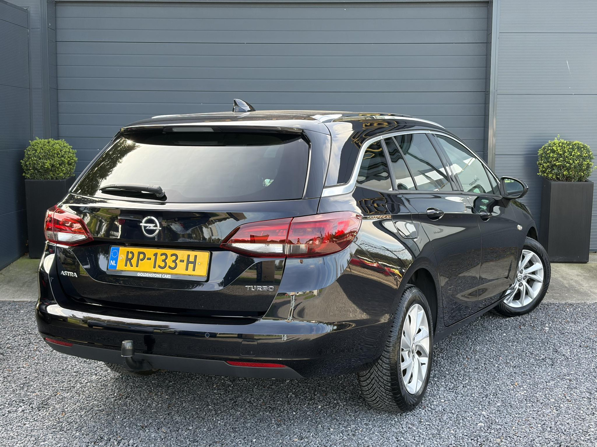 Opel Astra Sports Tourer 1.4 Business Executive ✓2 Eigenaar✓Camera✓Navi✓Trekhaakt✓Carplay✓Stoelverw✓Stuurverw✓Automaat✓Dealer Onderhouden✓Keyless✓Clima✓Cruise✓Pdc V+A✓Halfleder✓Comfortstoelen✓150pk✓Rijstrooksensor✓Dodehoeksensor✓Elekt Stoelen✓Lm velgen✓N.