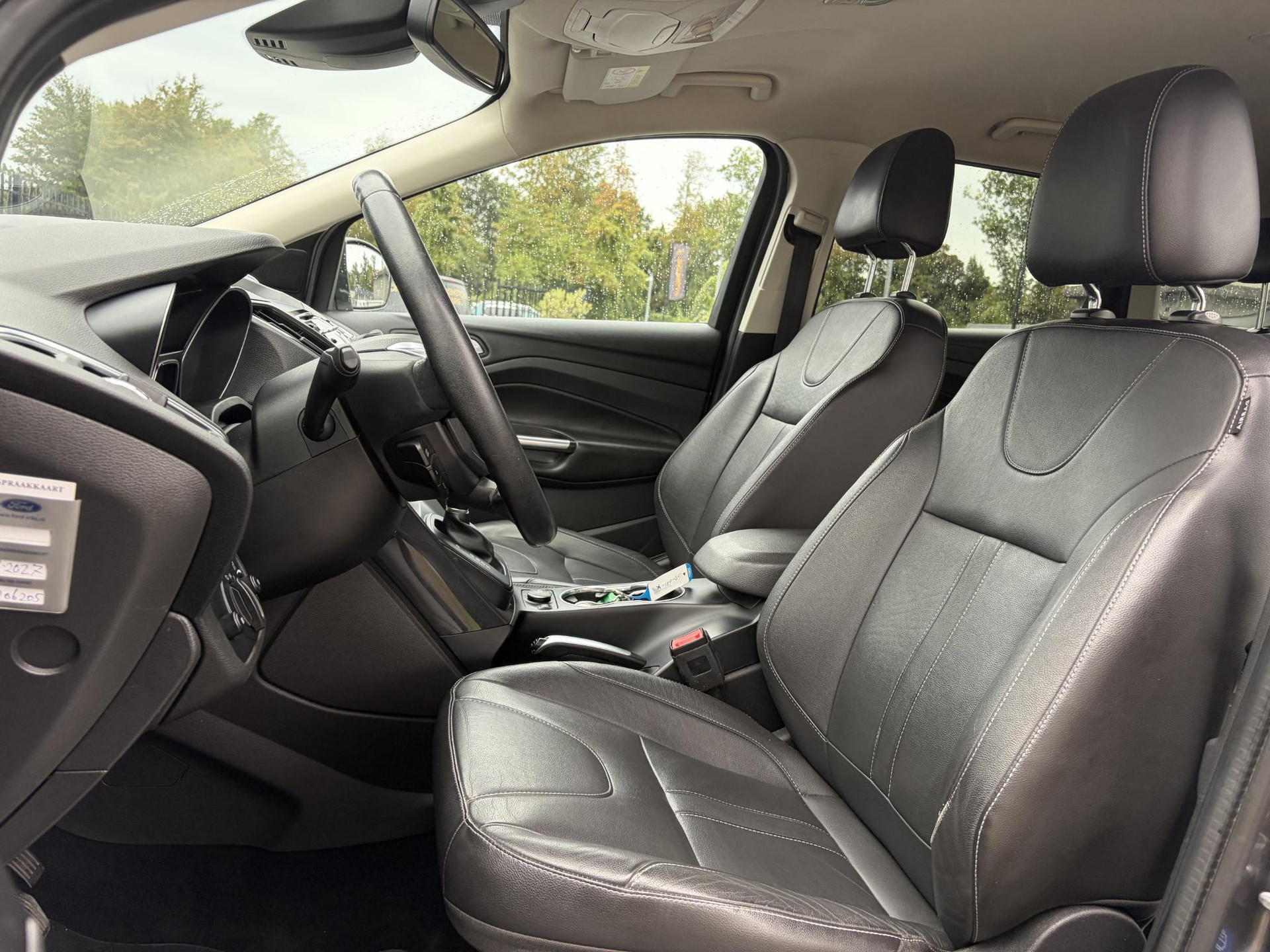 Ford Kuga 1.5 Titanium Plus 4WD ✓2e Eigenaar✓Camera✓183pk✓Trekhaak✓Leder✓Stoelverw✓Navi✓Clima✓Cruise✓Pdc V+A✓Elekt Stoelen✓Dodehoeksensor✓Net beurt gehad✓19''Lm velgen✓N.A.P✓Apk tot 08-2027