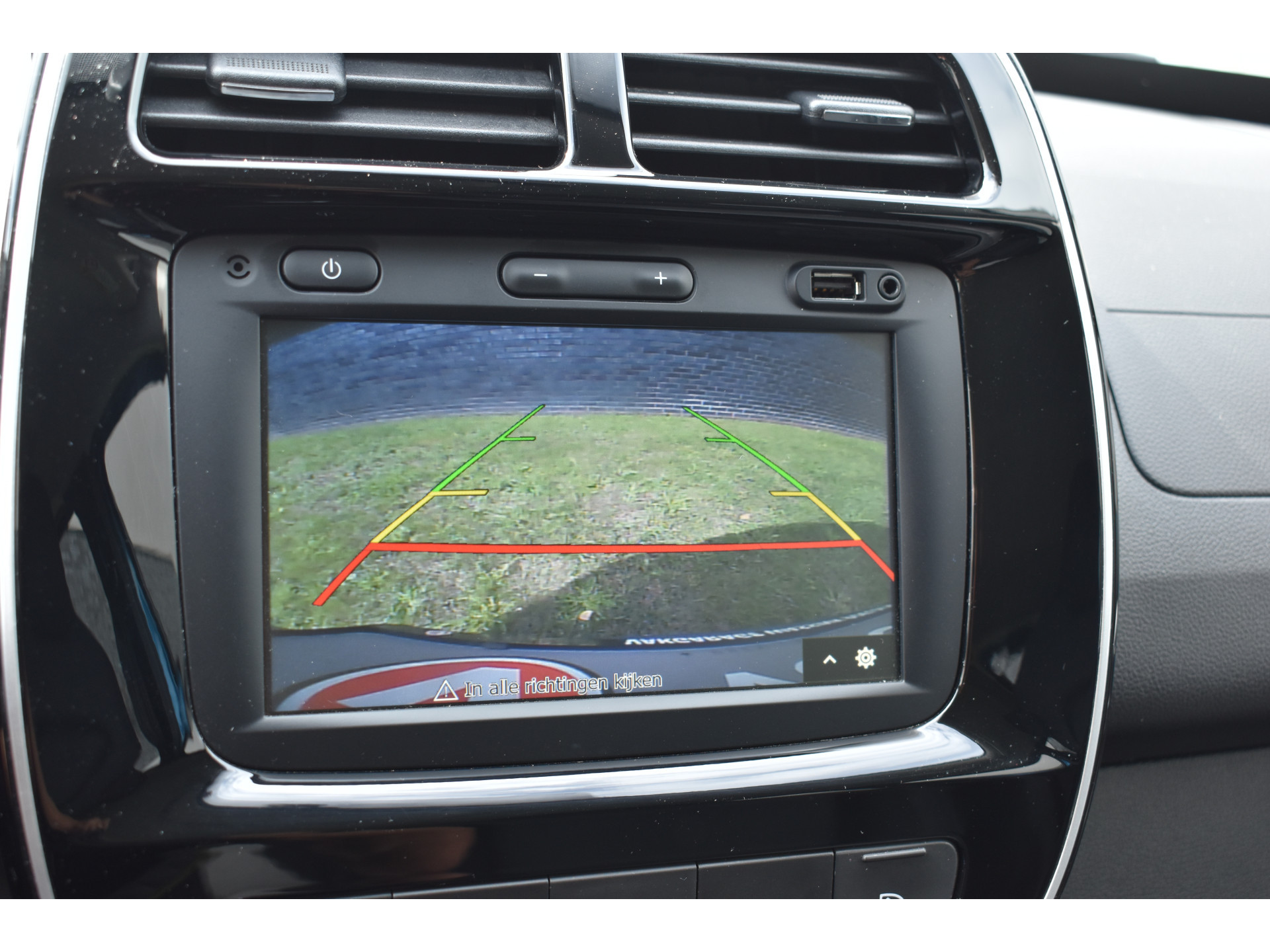 Dacia Spring Essential 27 kWh vol electric navigatie pdc Leer