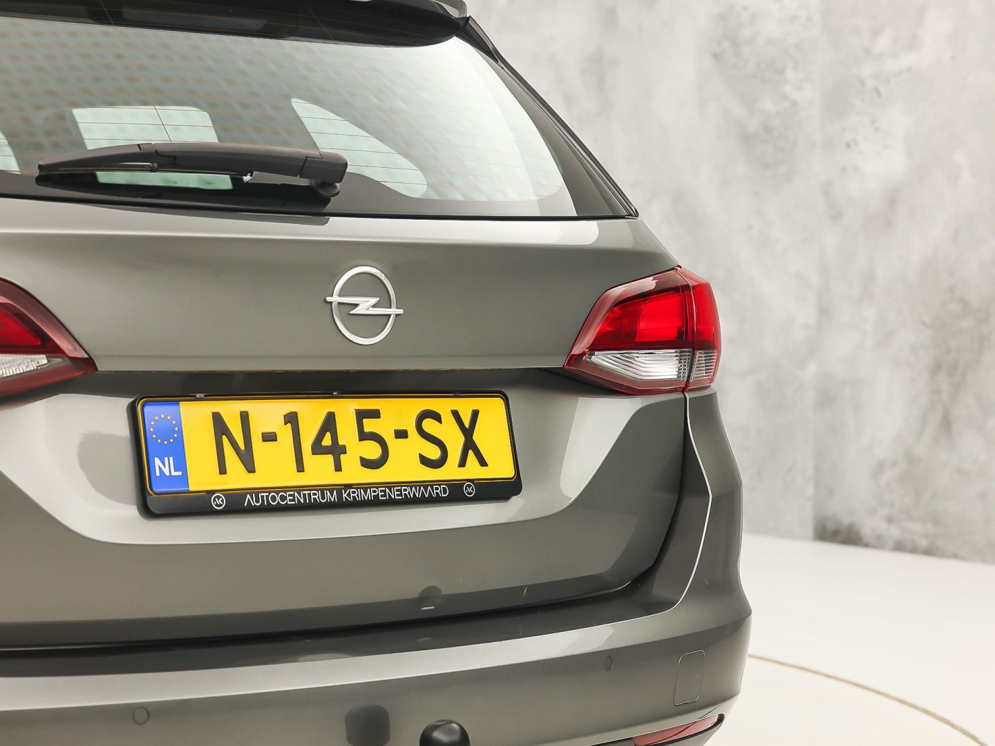 Opel Astra Sports Tourer 1.2 Sport (APPLE CARPLAY, NAVIGATIE, CRUISE, TREKHAAK, SPORTSTOELEN, PARKEERSENSOREN, NIEUWSTAAT)