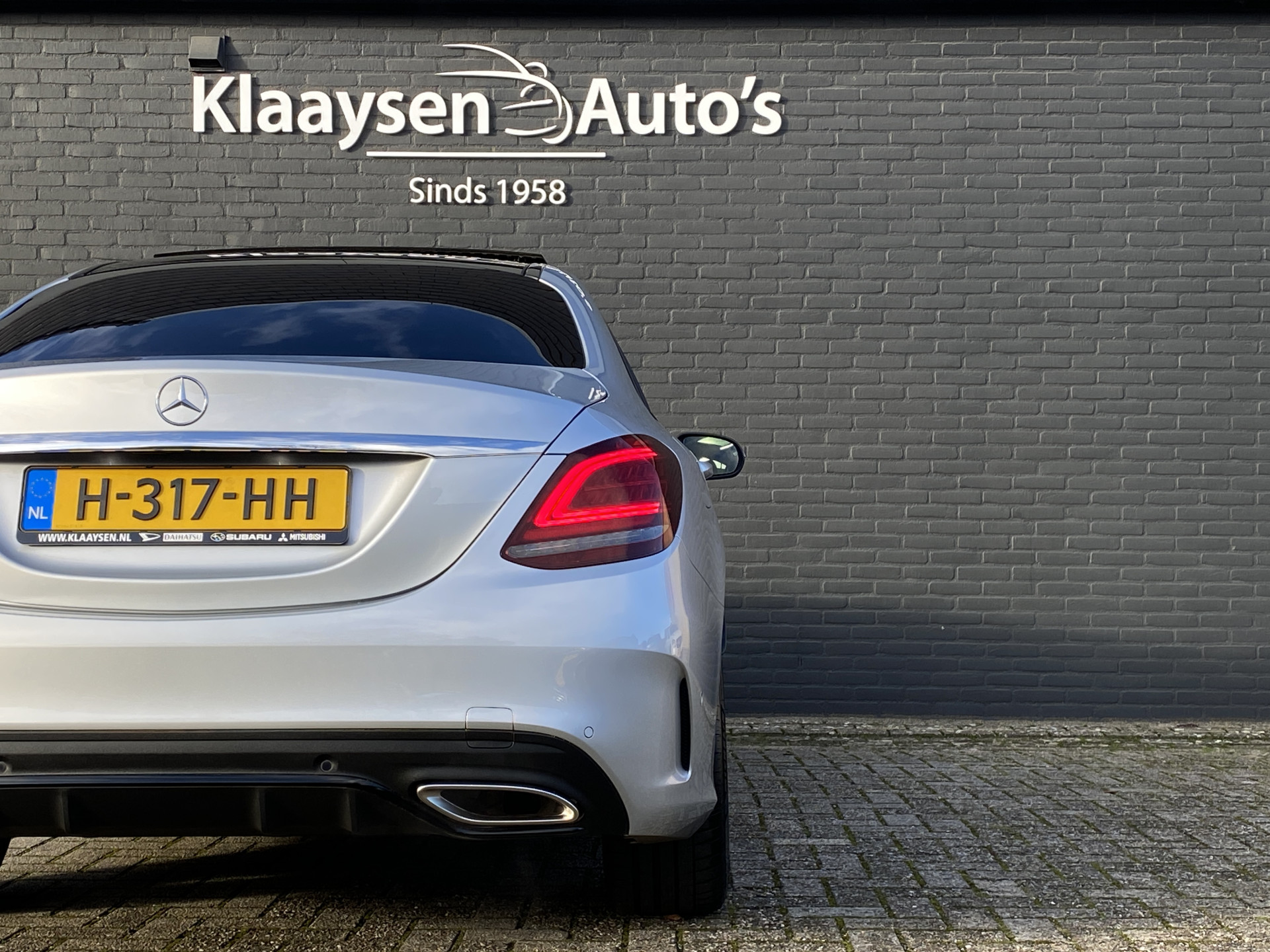 Mercedes-Benz C-klasse 180 Business Solution AMG AUT. | dealer onderhouden | panoramadak | night pakket | navigatie | NL auto