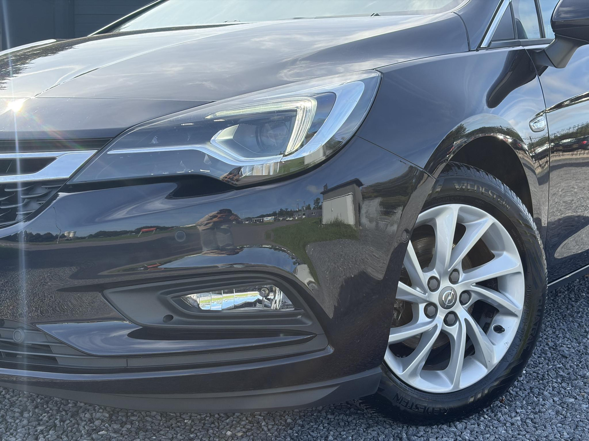 Opel Astra Sports Tourer 1.4 Business Executive ✓2 Eigenaar✓Camera✓Navi✓Trekhaakt✓Carplay✓Stoelverw✓Stuurverw✓Automaat✓Dealer Onderhouden✓Keyless✓Clima✓Cruise✓Pdc V+A✓Halfleder✓Comfortstoelen✓150pk✓Rijstrooksensor✓Dodehoeksensor✓Elekt Stoelen✓Lm velgen✓N.