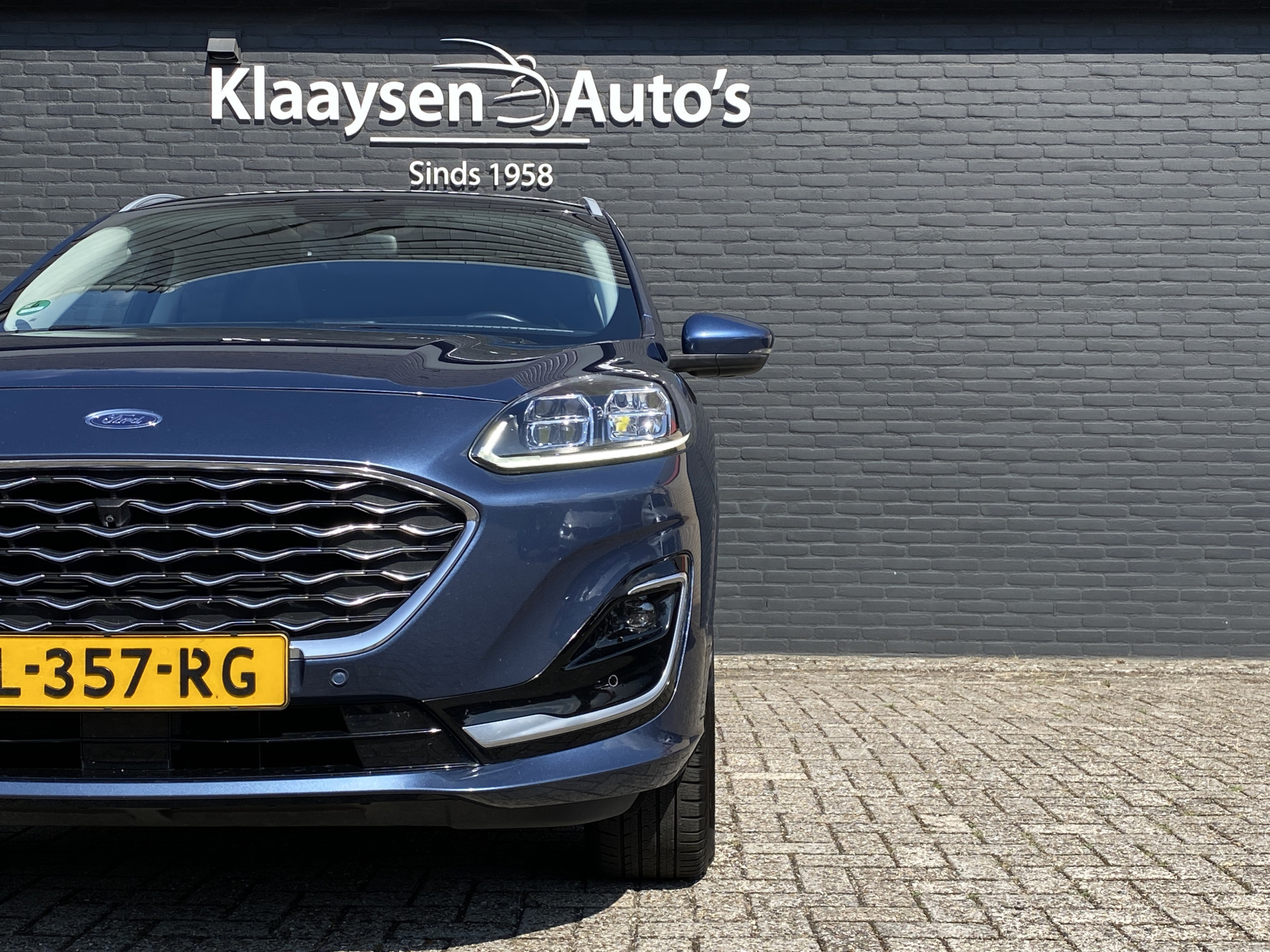 Ford Kuga 2.5 PHEV Vignale 225 pk | dealer onderh. | panoramadak | leder interieur | elektr. v. stoelen | navigatie | B&O audio