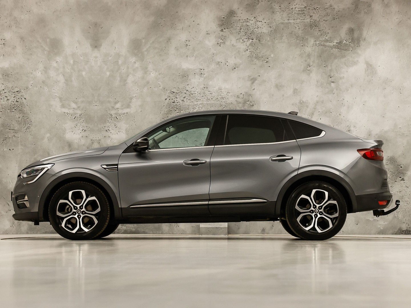 Renault Arkana 1.6 E-Tech Hybrid 145 Intens 145Pk Automaat (GROOT NAVI, CAMERA, STOELVERWARMING, SPORTSTOELEN, ADAPTIVE CRUISE, GETINT GLAS, KEYLESS, NIEUWSTAAT)