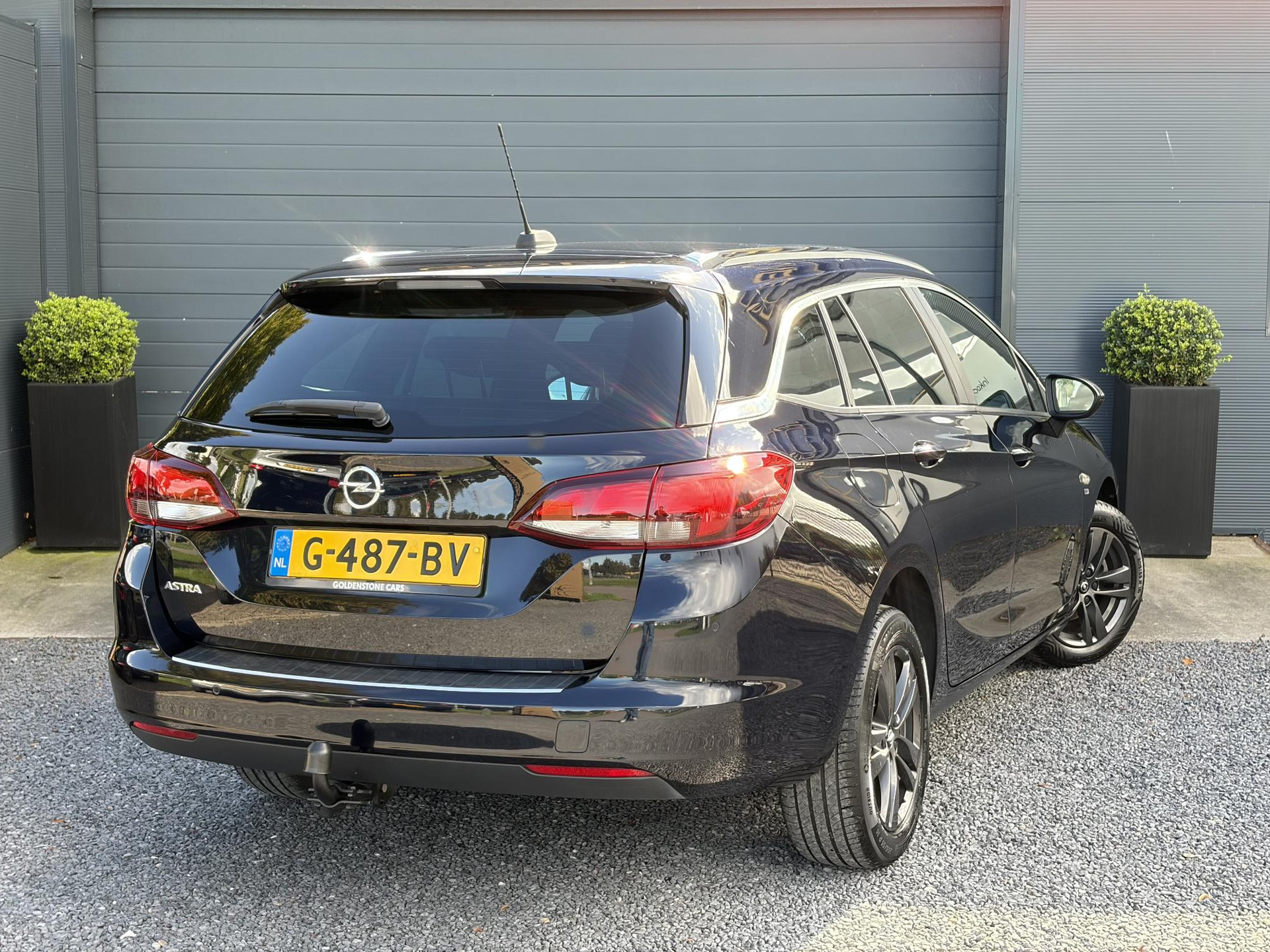 Opel Astra Sports Tourer 1.4 Turbo 120 Jaar Edition ✓150pk✓Carplay✓Navi✓Trekhaak✓Pdc V+A✓Clima✓Cruise✓6 Bak✓Lm velgen✓N.A.P✓Apk tot 02-2028