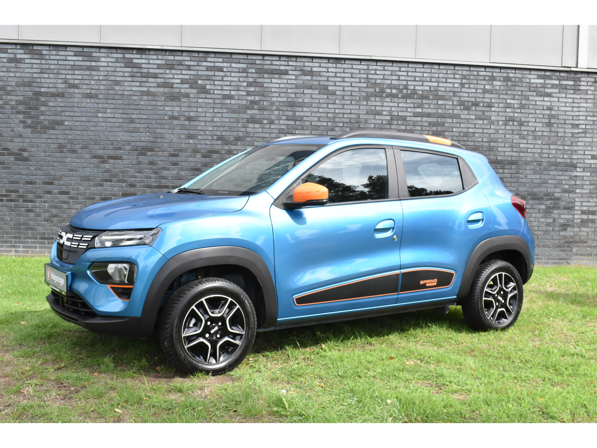 Dacia Spring Essential 27 kWh vol electric navigatie pdc Leer
