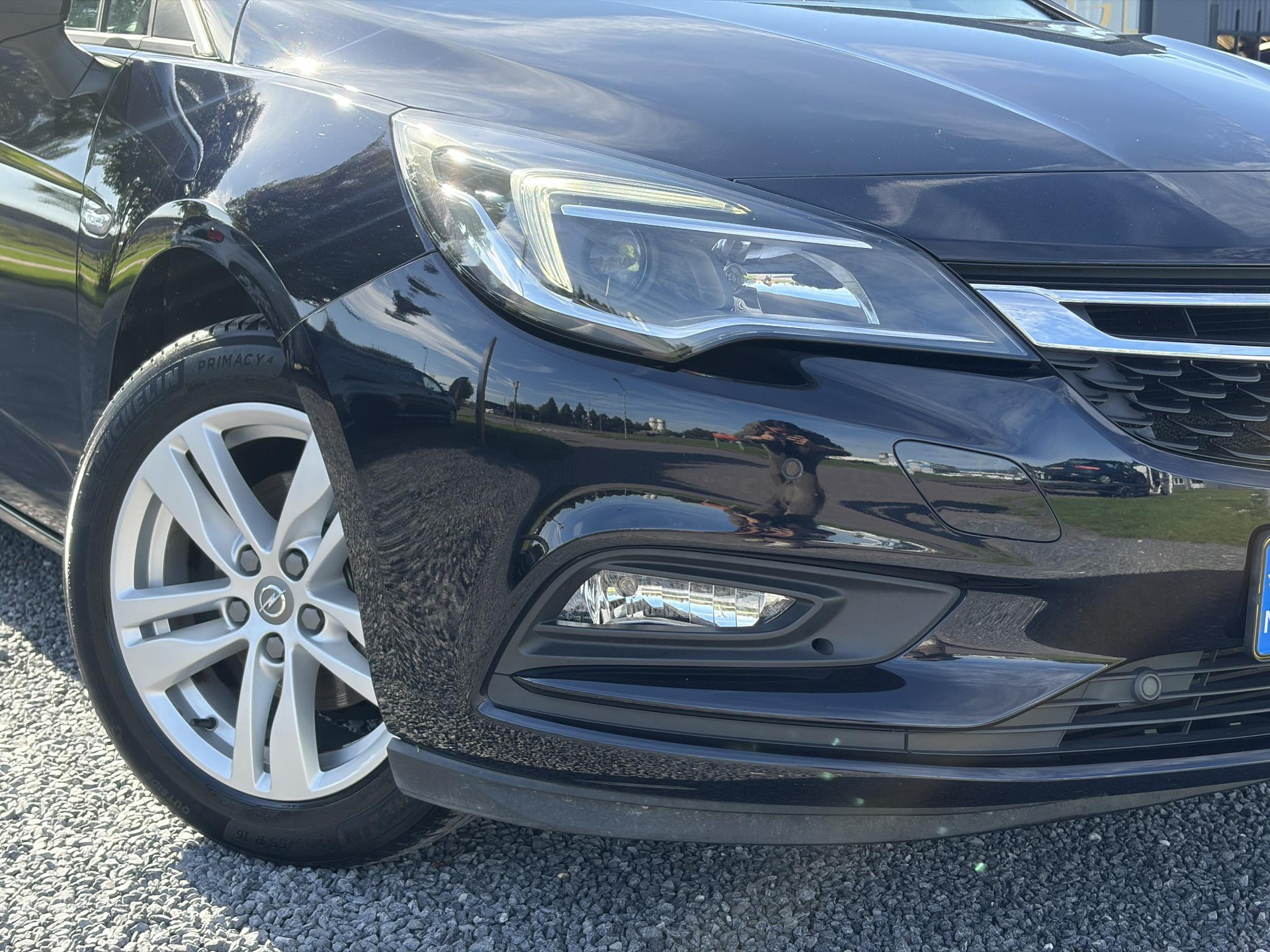 Opel Astra Sports Tourer 1.4 Turbo Online Edition ✓150pk✓2e Eigenaar✓Camera✓Carplay✓Navi✓Pdc V+A✓Stoelverw✓Stuurverw✓Clima✓Cruise✓Lm velgen✓6 Bak✓Comfortstoelen✓Dealer Onderhouden✓N.A.P✓Bj 12-2018✓Apk tot 01-2027