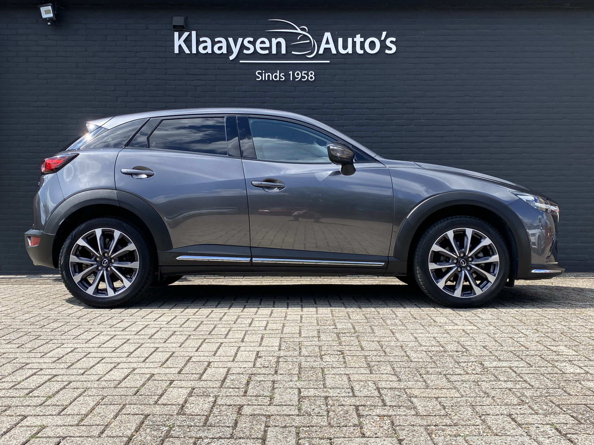 Mazda CX-3 2.0 SkyActiv-G 120 GT-M AUT. | navigatie | trekhaak | leder interieur | head up display | camera | apple carplay