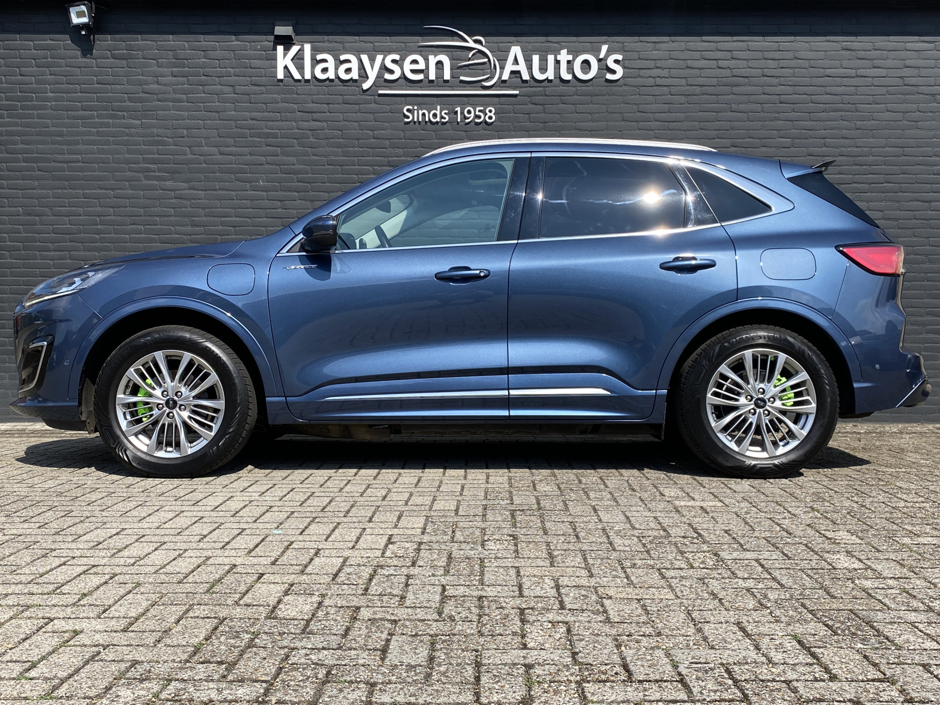 Ford Kuga 2.5 PHEV Vignale 225 pk | dealer onderh. | panoramadak | leder interieur | elektr. v. stoelen | navigatie | B&O audio