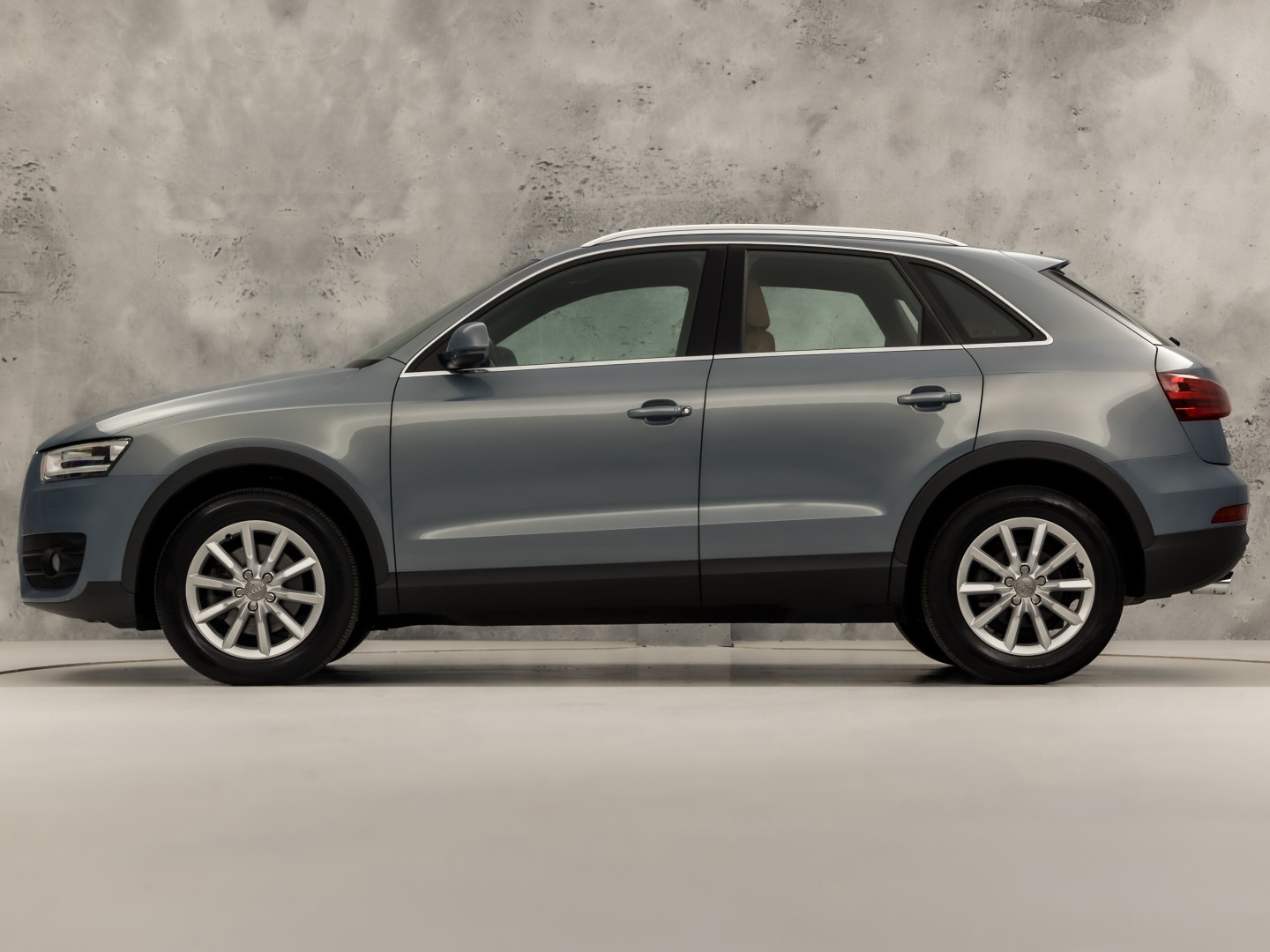 Audi Q3 2.0 TFSI Quattro Sport 211Pk Automaat (NAVIGATIE, CLIMATE, ZWART HEMEL, BRUIN LEDER, SPORTSTOELEN, CRUISE, PARKEERSENSOREN, XENON, NIEUWSTAAT)