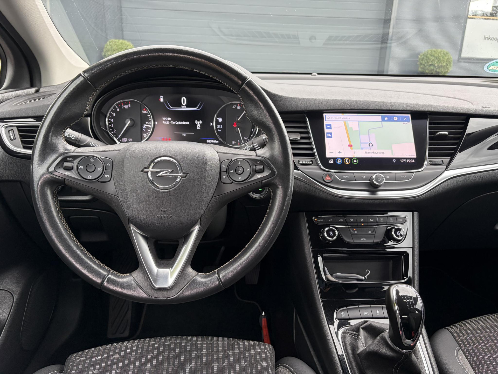 Opel Astra 1.2 Business Elegance 2e Eigenaar l Navi l Camera l Carplay l Keyless l Trekhaak l 110pk l Pdc V+A l Halfleder l 6 Bak l N.A.P l | Lm velgen l Rijstrooksensor l Apk tot 07-2027