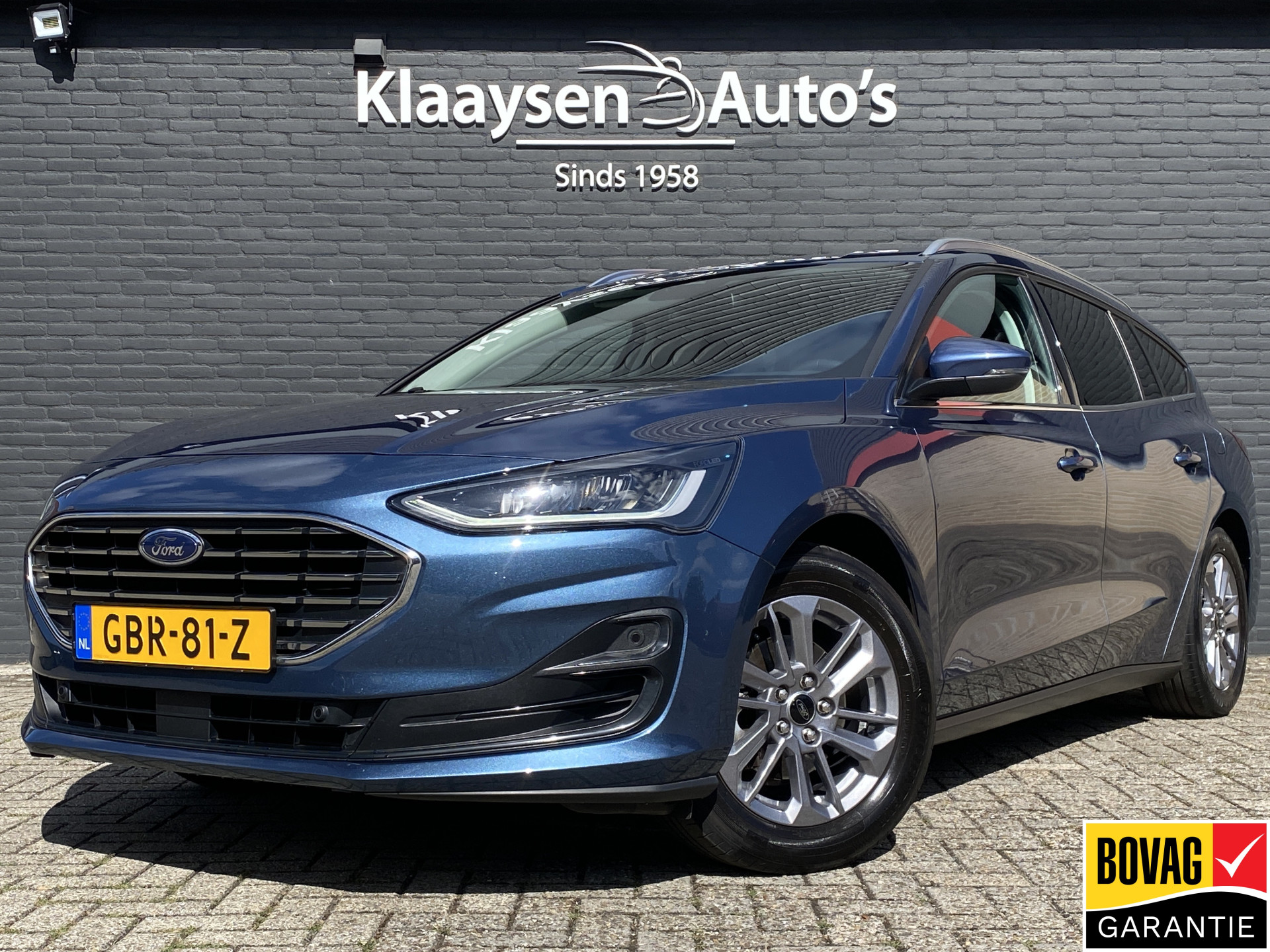 Ford Focus Wagon 1.0 EcoBoost Hybrid 155 pk Titanium AUT. | 1e eigenaar | dealer onderh. | navigatie | cruise control | BTW auto
