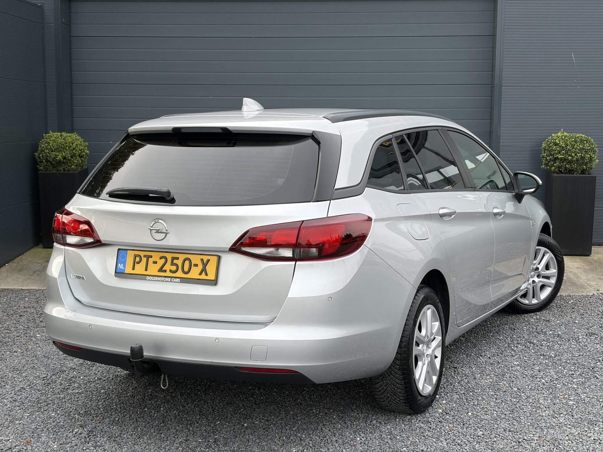 Opel Astra Sports Tourer 1.0 Online Edition ✓2e Eigenaar✓Carplay✓Navi✓Trekhaak✓Net beurt gehad✓Clima✓Cruise✓Pdc V+A✓105pk✓N.A.P✓Lm velgen✓Apk tot 10-2027