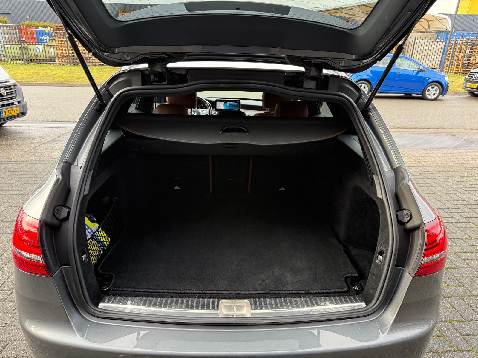 Mercedes-Benz C-klasse Estate 180 Business Solution AMG | 1E EIGENAAR | 3/6/12MND GARANTIE | DAB | LED | AUTOMAAT | LEDER | CRUISE | SFEERVERLICHTING |