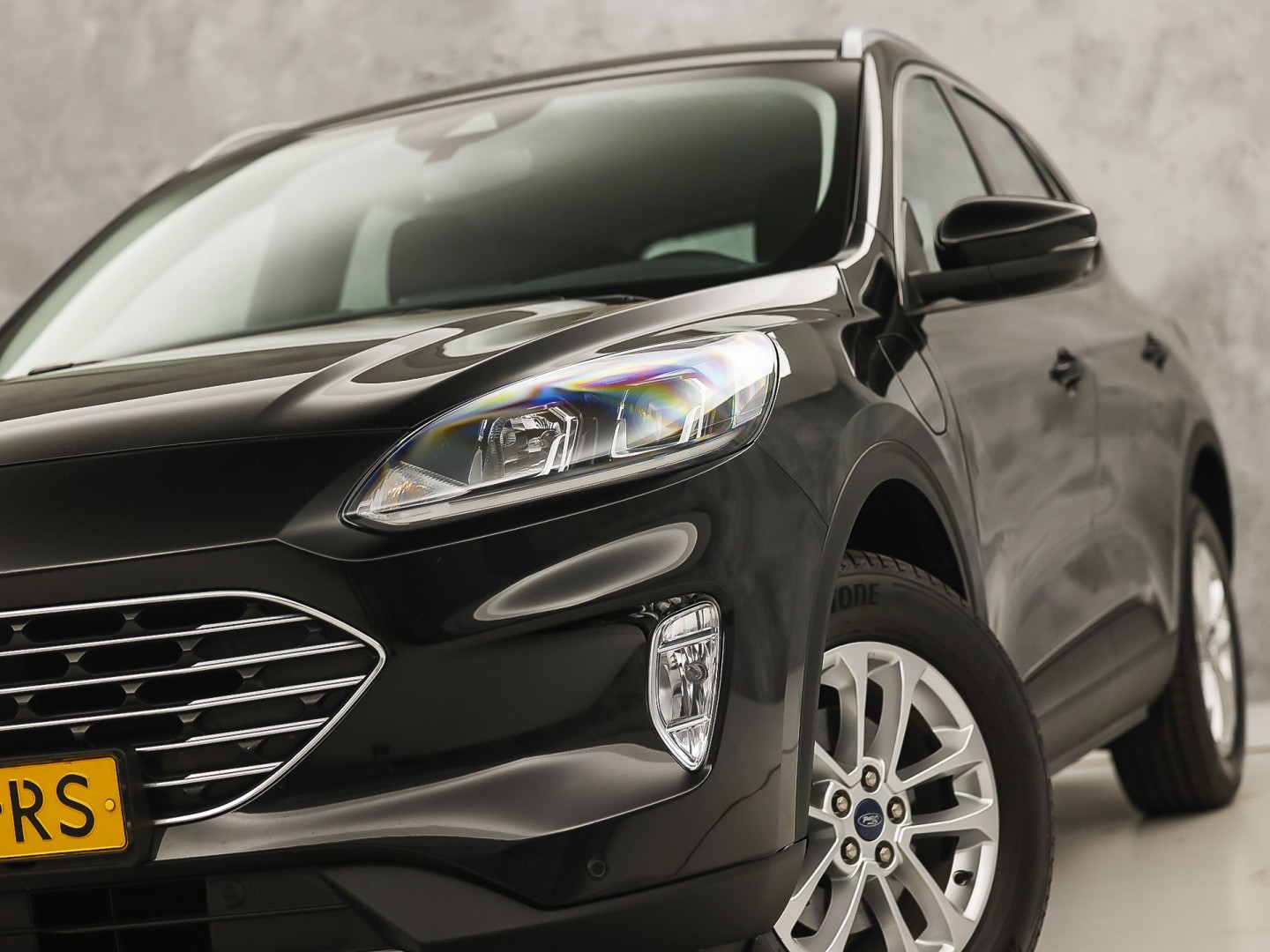 Ford Kuga 2.5 PHEV Titanium Sport 225Pk Automaat (VIRTUAL COCKPIT, SOH 93%, APPLE CARPLAY, GROOT NAVI, CAMERA, SPORTSTOELEN, CRUISE, TREKHAAK, NIEUWSTAAT)
