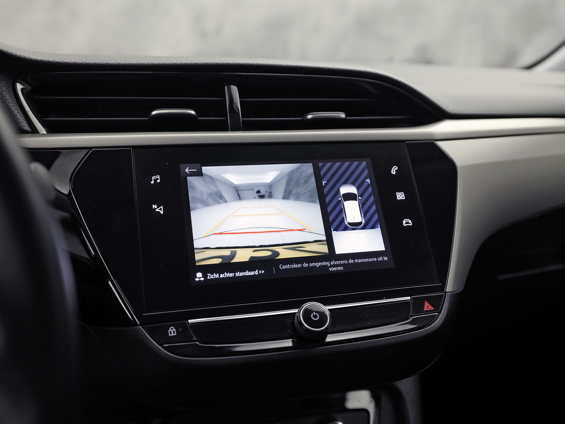Opel Corsa 1.2 Sport (APPLE CARPLAY, GROOT NAVI, 360 CAMERA, CRUISE, PARKEERSENSOREN, LEDER STUURWIEL, SPORTSTOELEN, LM VELGEN, NIEUWSTAAT)