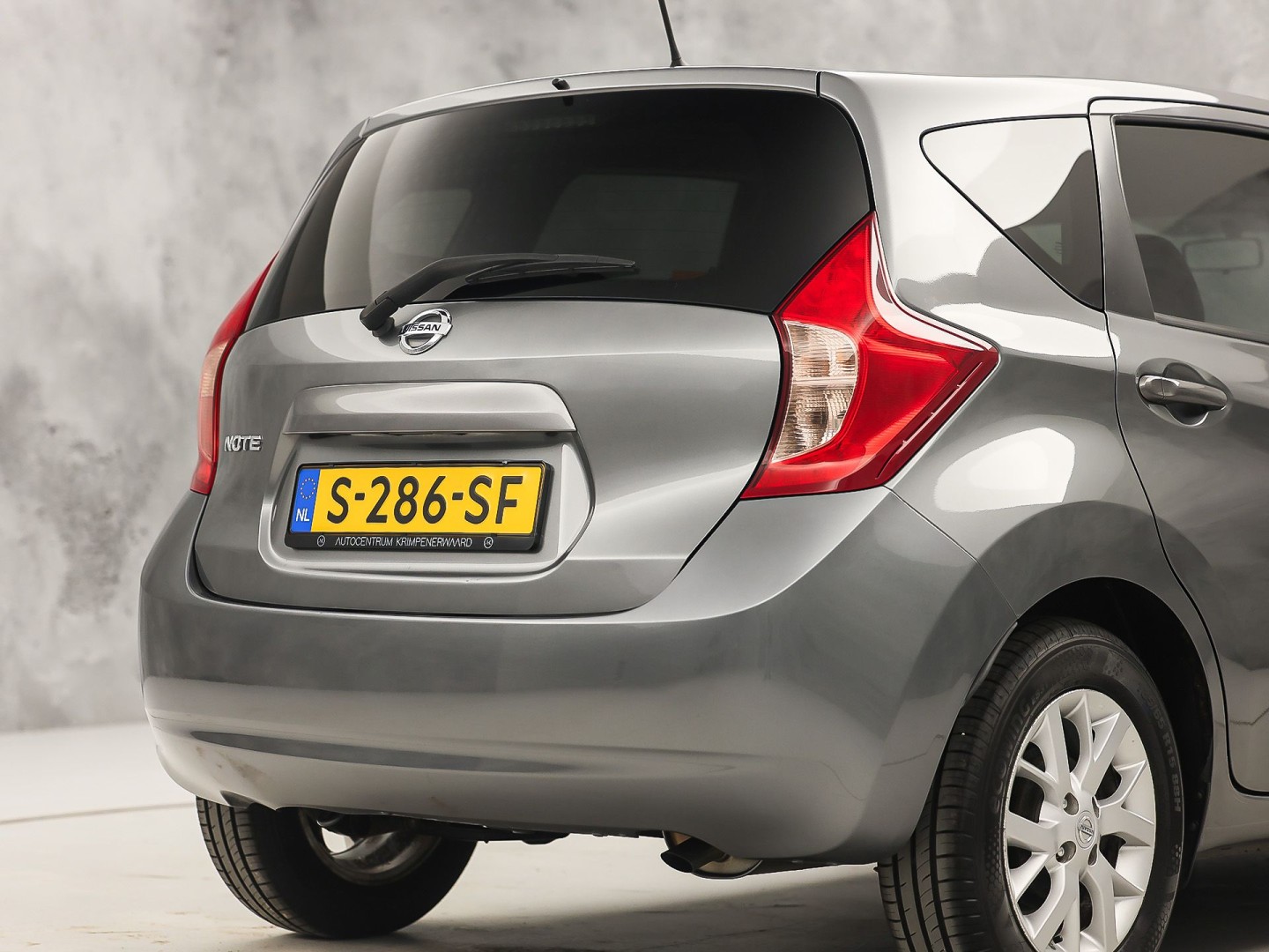 Nissan Note 1.2 Sport (AIRCO, GETINT GLAS, LM VELGEN, SPORTSTOELEN, CRUISE, NIEUWE APK, NIEUWSTAAT)