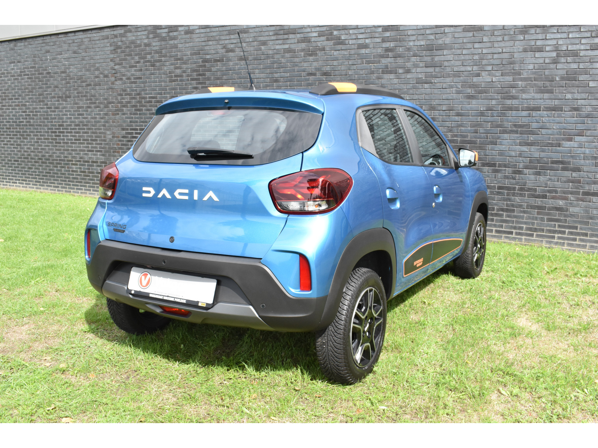 Dacia Spring Essential 27 kWh vol electric navigatie pdc Leer