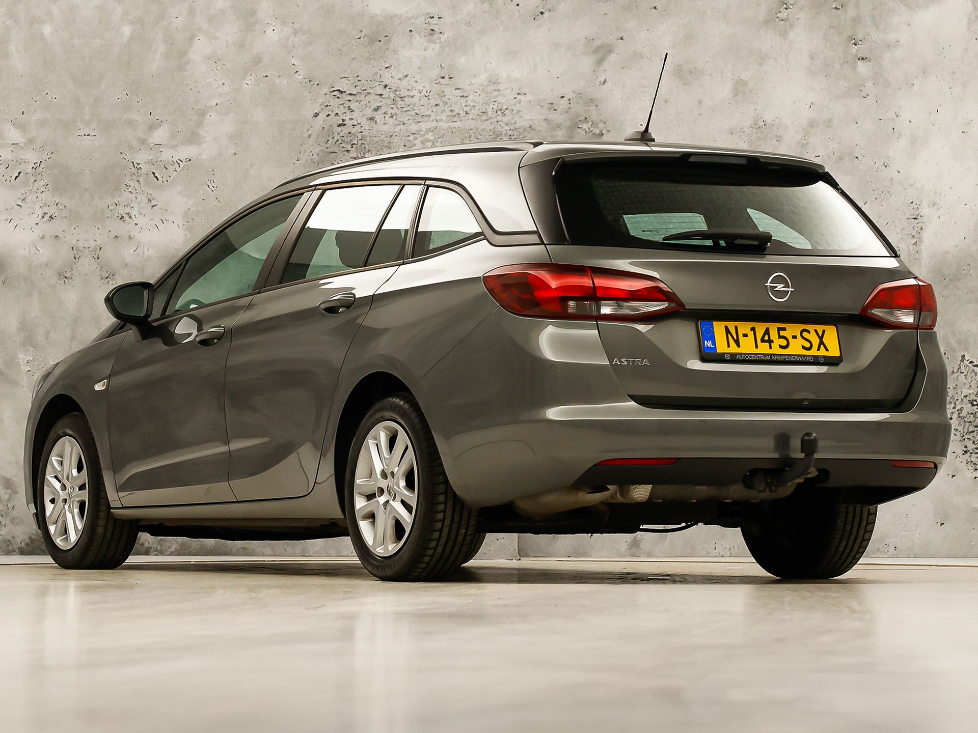 Opel Astra Sports Tourer 1.2 Sport (APPLE CARPLAY, NAVIGATIE, CRUISE, TREKHAAK, SPORTSTOELEN, PARKEERSENSOREN, NIEUWSTAAT)
