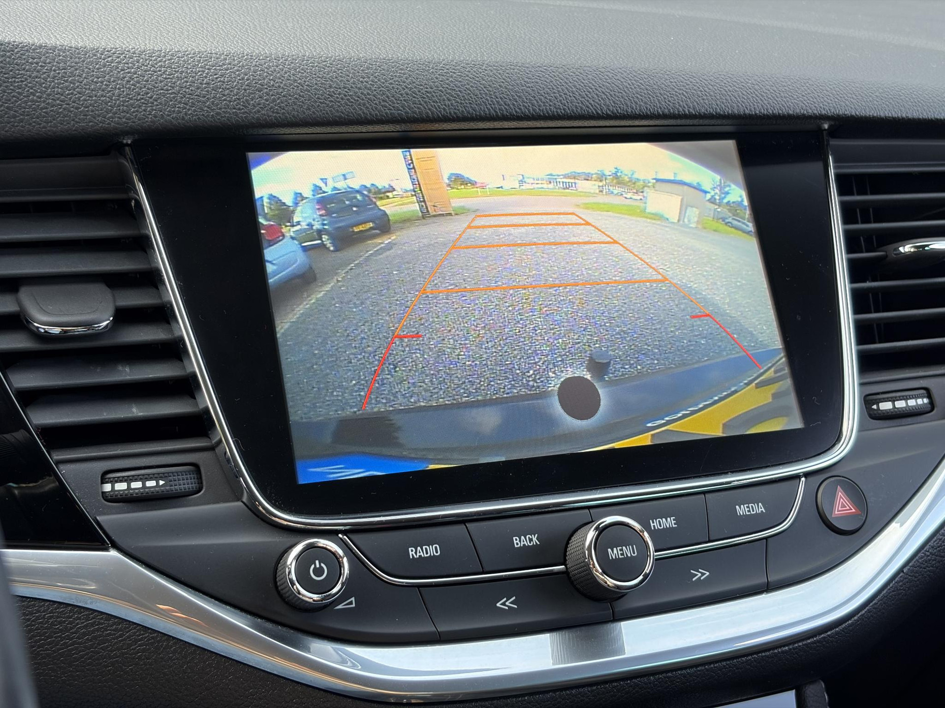Opel Astra Sports Tourer 1.4 Business Executive ✓2 Eigenaar✓Camera✓Navi✓Trekhaakt✓Carplay✓Stoelverw✓Stuurverw✓Automaat✓Dealer Onderhouden✓Keyless✓Clima✓Cruise✓Pdc V+A✓Halfleder✓Comfortstoelen✓150pk✓Rijstrooksensor✓Dodehoeksensor✓Elekt Stoelen✓Lm velgen✓N.