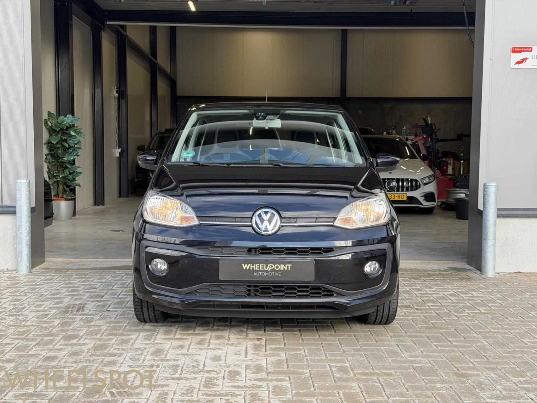 Volkswagen Up! 1.0 BMT high up!|Cruise|Camera|Clima|Stoelver