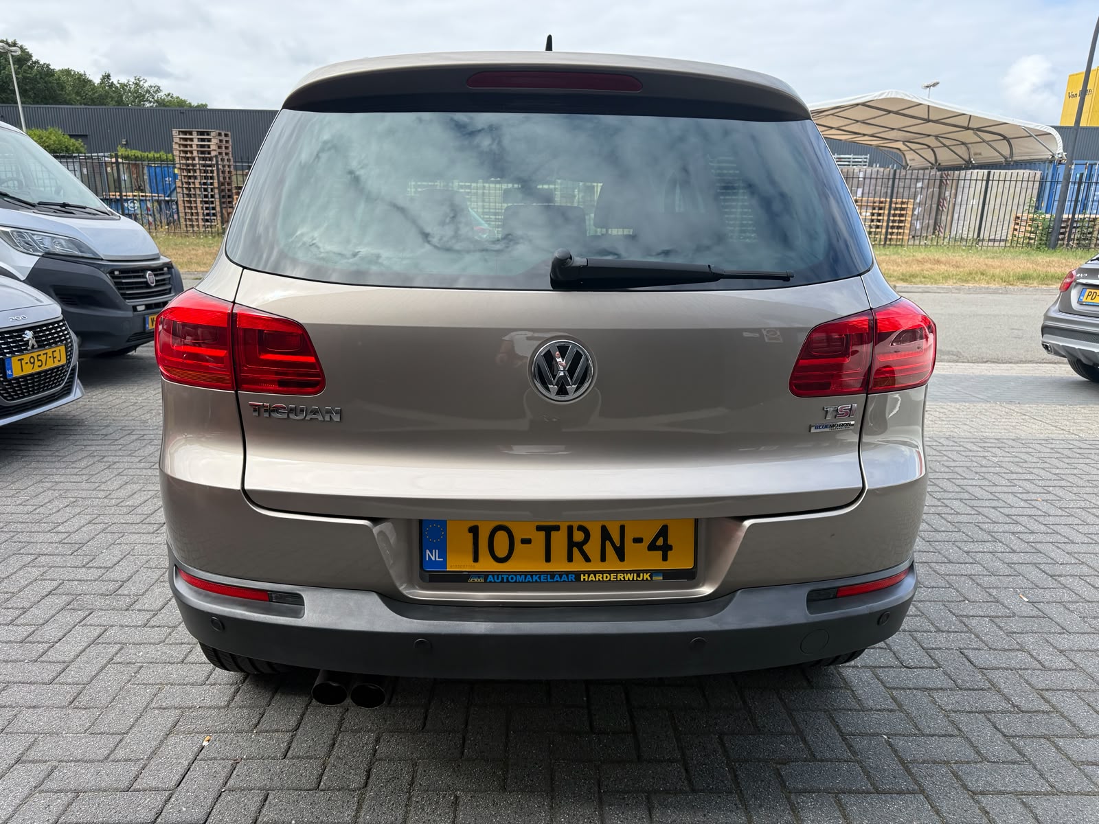 Volkswagen Tiguan 1.4 TSI Sport&Style | 1E EIGENAAR | 3/6/12MND GARANTIE | NAVI | PDC | 160 PK | LAGE KM |