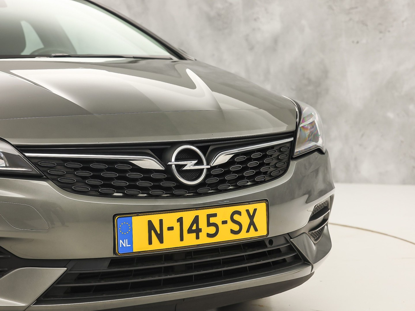 Opel Astra Sports Tourer 1.2 Sport (APPLE CARPLAY, NAVIGATIE, CRUISE, TREKHAAK, SPORTSTOELEN, PARKEERSENSOREN, NIEUWSTAAT)