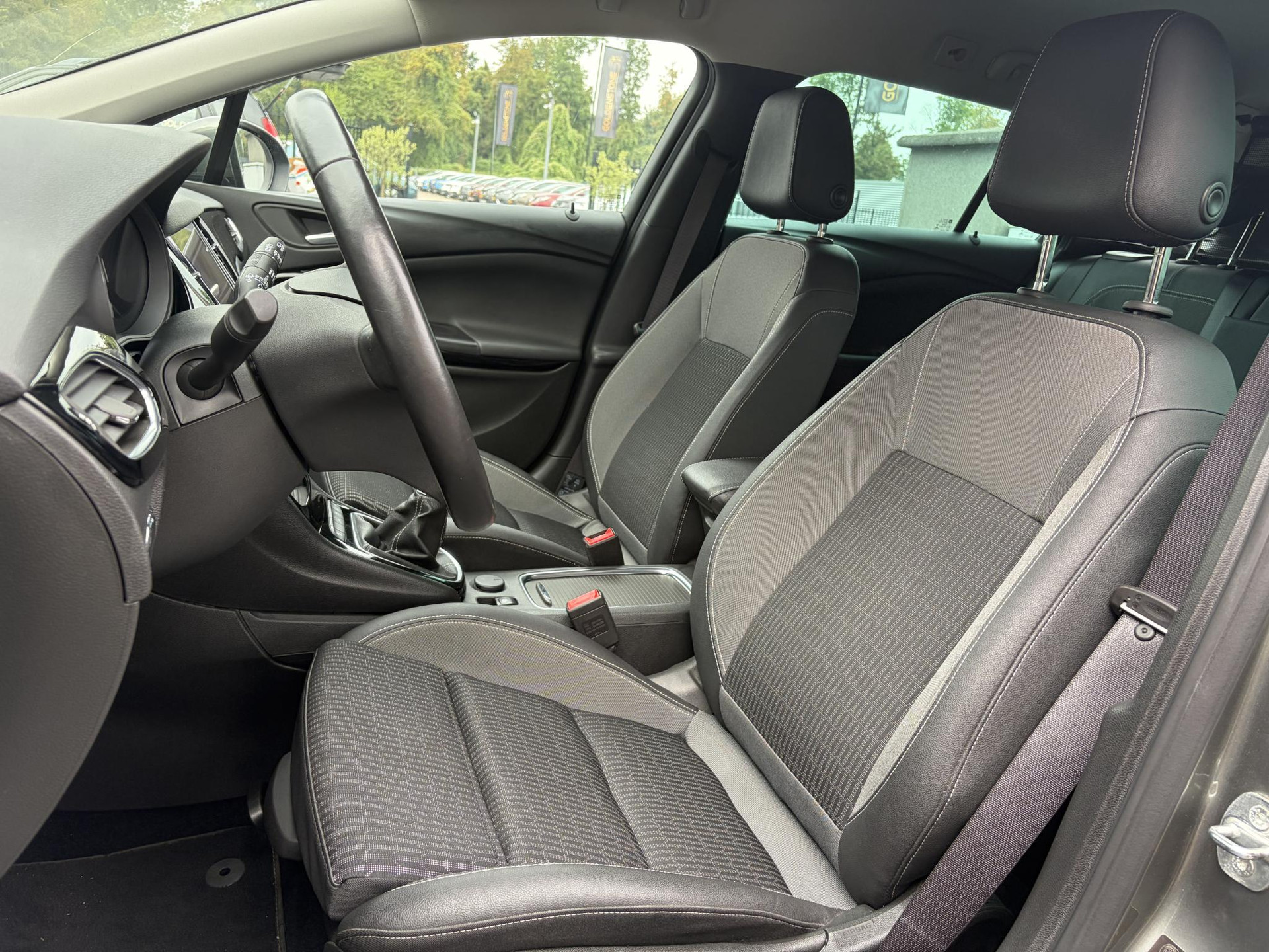 Opel Astra Sports Tourer 1.2 Elegance ✓131pk✓2e Eigenaar✓Camera✓Carplay✓6 Bak✓Stoelverw✓Stuurverw✓Pdc V+A✓Recent beurt gehad✓Clima✓Cruise✓Halfleder✓Keyless✓N.A.P✓Lm velgen✓Rijstrooksensor✓Apk tot 09-2028