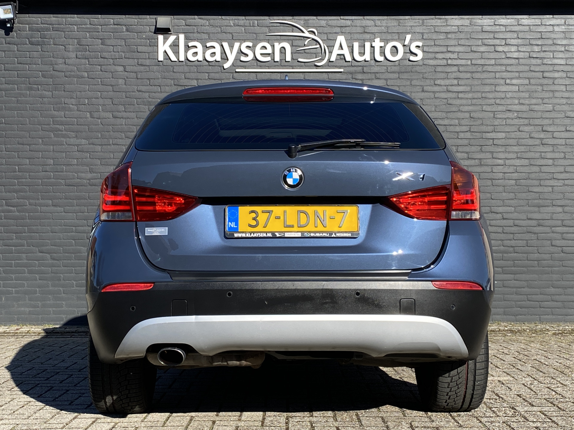 BMW X1 sDrive18i Executive AUT. | navigatie | panoramadak | sportstoelen | xenon verlichting | lichtmetalen velgen 18 inch
