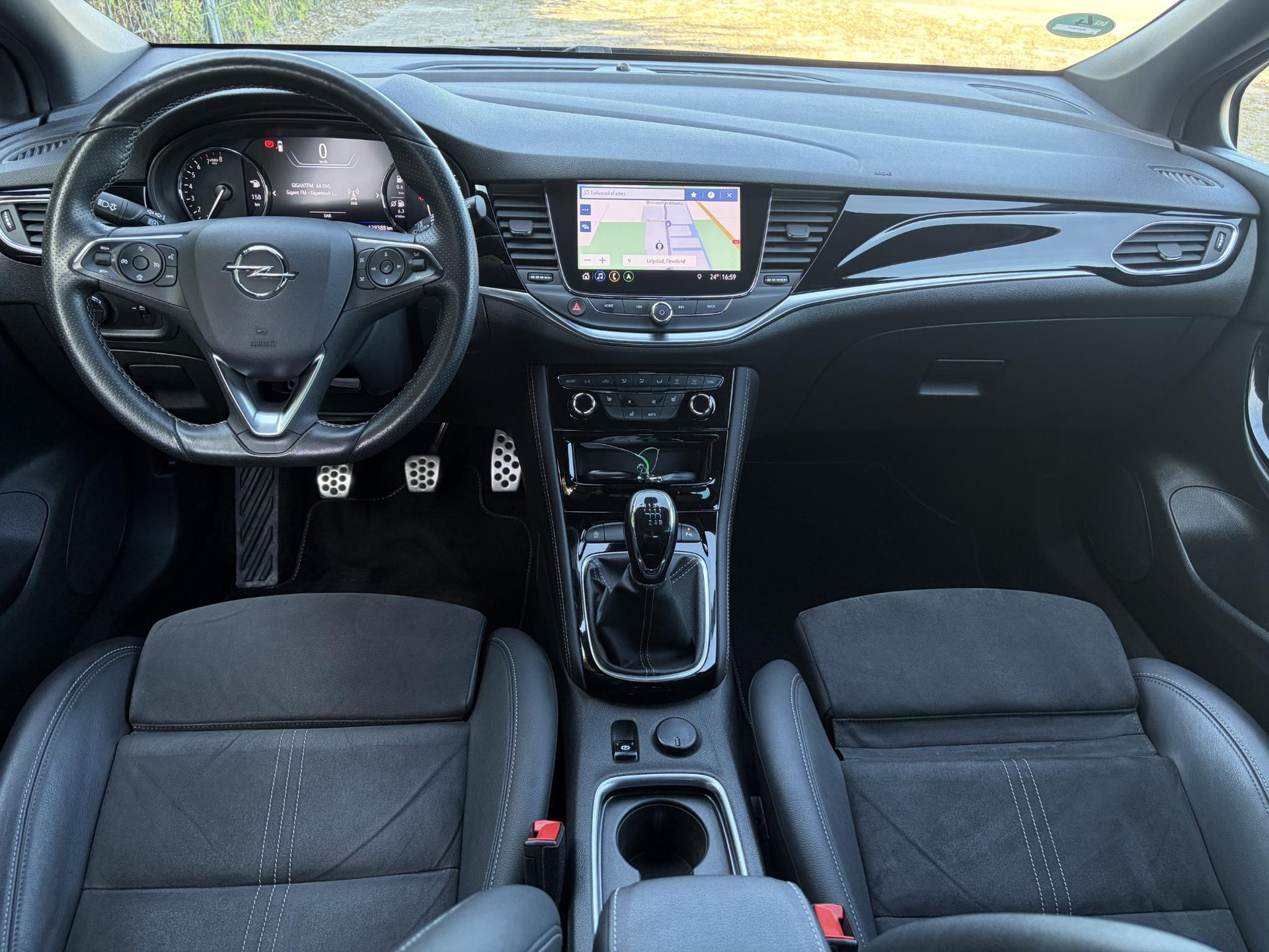 Opel Astra Sports Tourer 1.2 Ultimate ✓146pk✓2e Eigenaar✓Trekhaak✓Camera✓Carplay✓Navi✓Alcantara-Leder✓17''Lmv✓Stoelverw-Stuurverw✓Net beurt gehad✓Dodehoek✓Rijstrooksensor✓Pdc V+A✓6 Bak✓N.A.P✓Bj 11-2020✓Apk tot 08-2028