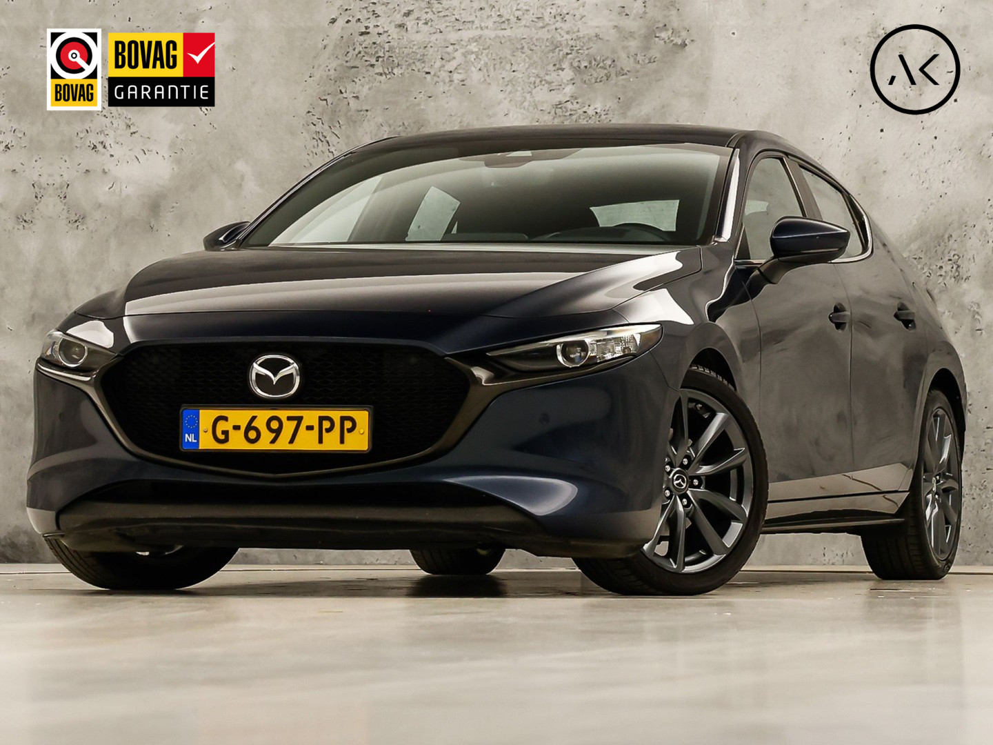 Mazda 3 2.0 e-SkyActiv-G M Hybrid 122 Automaat (GROOT NAVI, CLIMATE, STUUR/STOELVERWARMING, BOSE AUDIO, CAMERA, SPORTSTOELEN, ADAPTIVE CRUISE, HEAD-UP DISPLAY, NIEUWSTAAT)