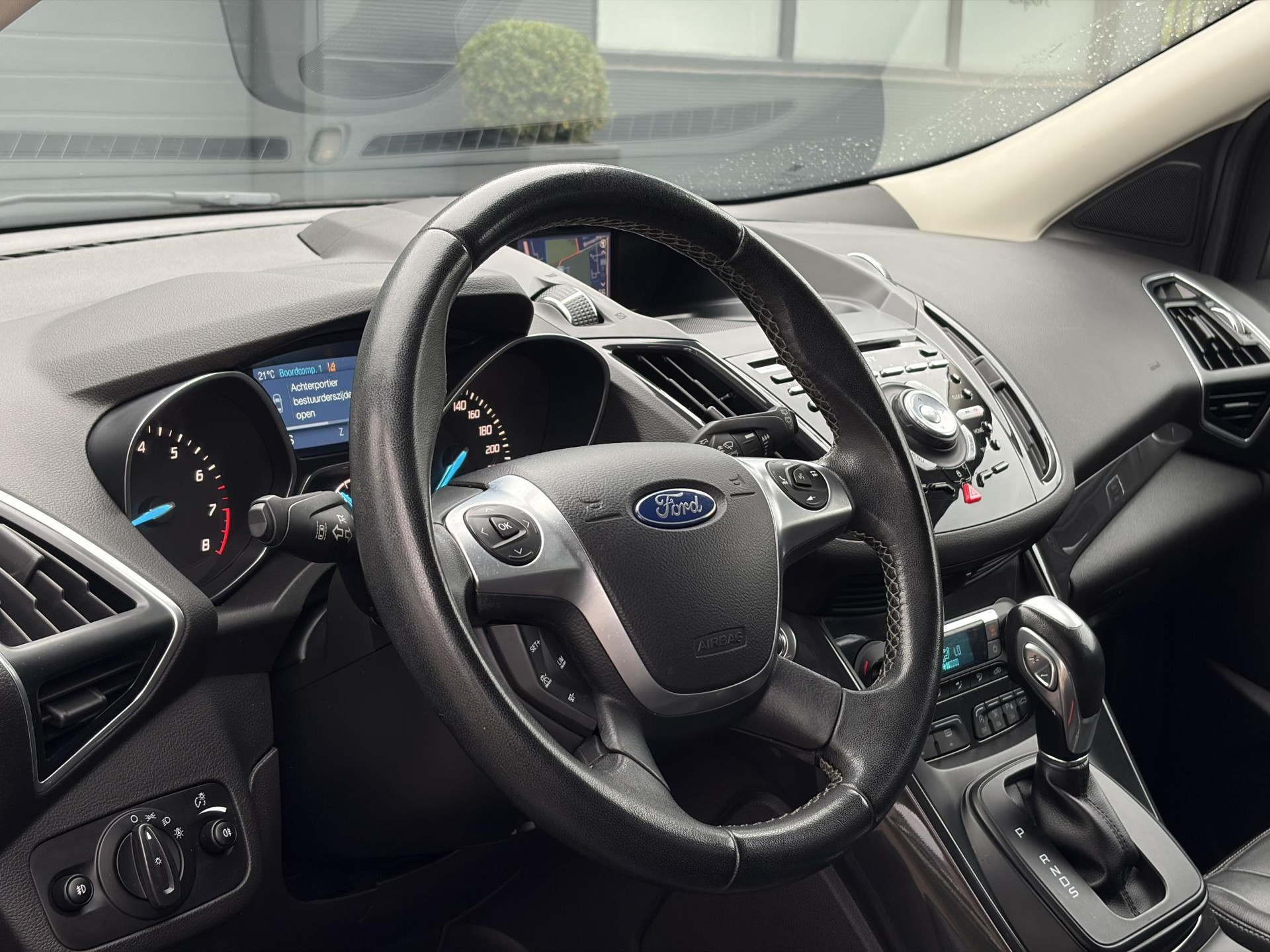 Ford Kuga 1.5 Titanium Plus 4WD ✓2e Eigenaar✓Camera✓183pk✓Trekhaak✓Leder✓Stoelverw✓Navi✓Clima✓Cruise✓Pdc V+A✓Elekt Stoelen✓Dodehoeksensor✓Net beurt gehad✓19''Lm velgen✓N.A.P✓Apk tot 08-2027