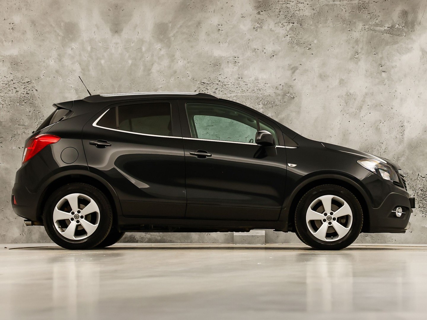 Opel Mokka 1.4 T Cosmo Sport 140Pk (SCHUIFDAK, NAVIGATIE, CLIMATE, STUUR/STOELVERWARMING, SPORTSTOELEN, GETINT GLAS, CAMERA, NIEUWSTAAT)