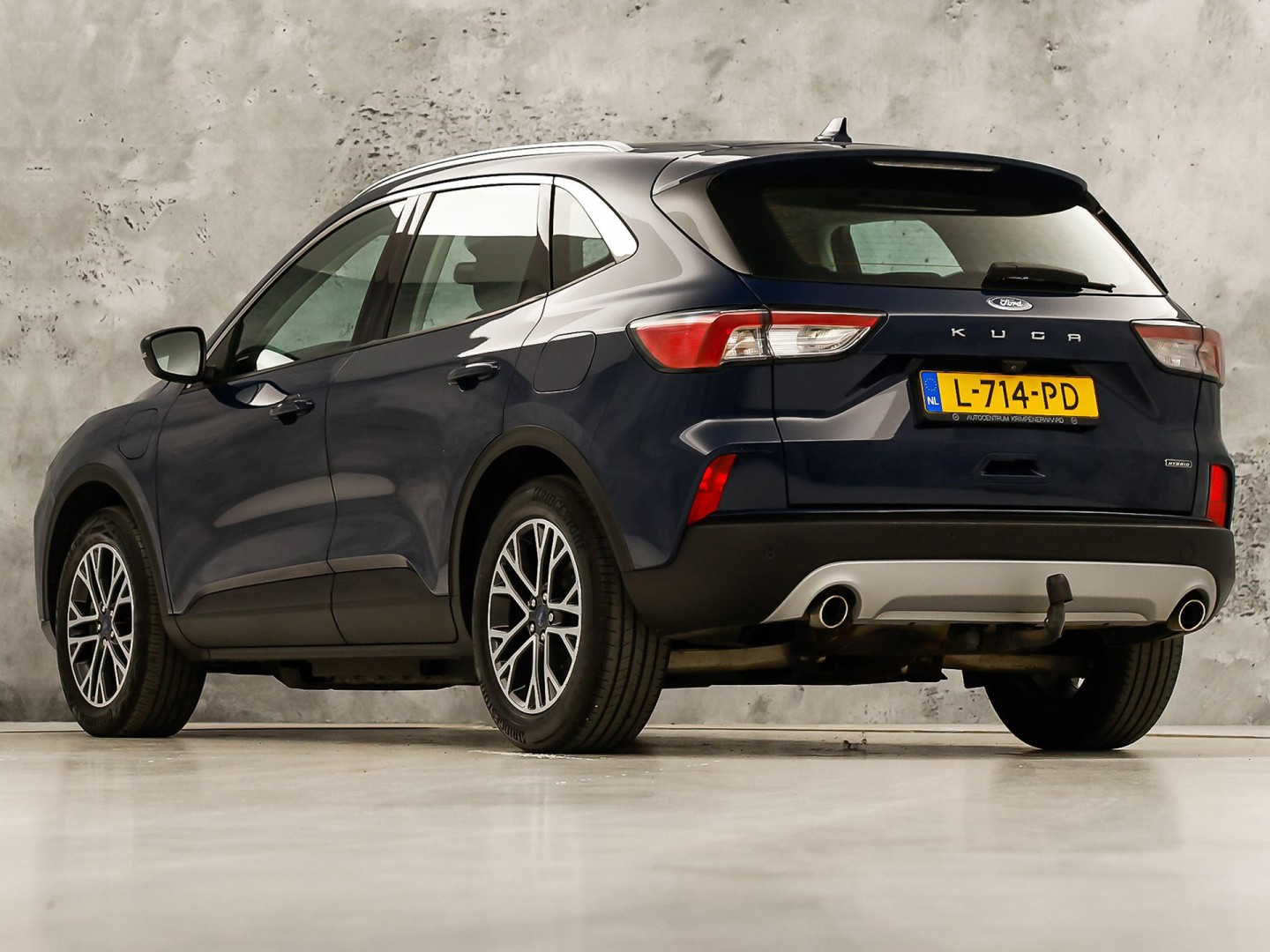 Ford Kuga 2.5 PHEV Titanium 225Pk Automaat (VIRTUAL COCKPIT, APPLE CARPLAY, GROOT NAVI, CAMERA, TREKHAAK, SPORTSTOELEN, KEYLESS, CRUISE, LANE ASSIST, NIEUWSTAAT)