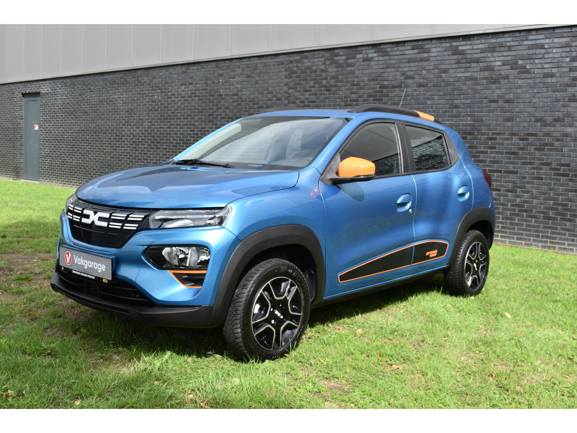 Dacia Spring Essential 27 kWh vol electric navigatie pdc Leer