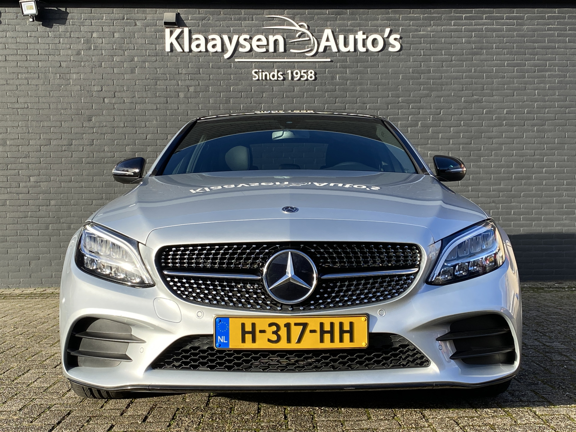 Mercedes-Benz C-klasse 180 Business Solution AMG AUT. | dealer onderhouden | panoramadak | night pakket | navigatie | NL auto