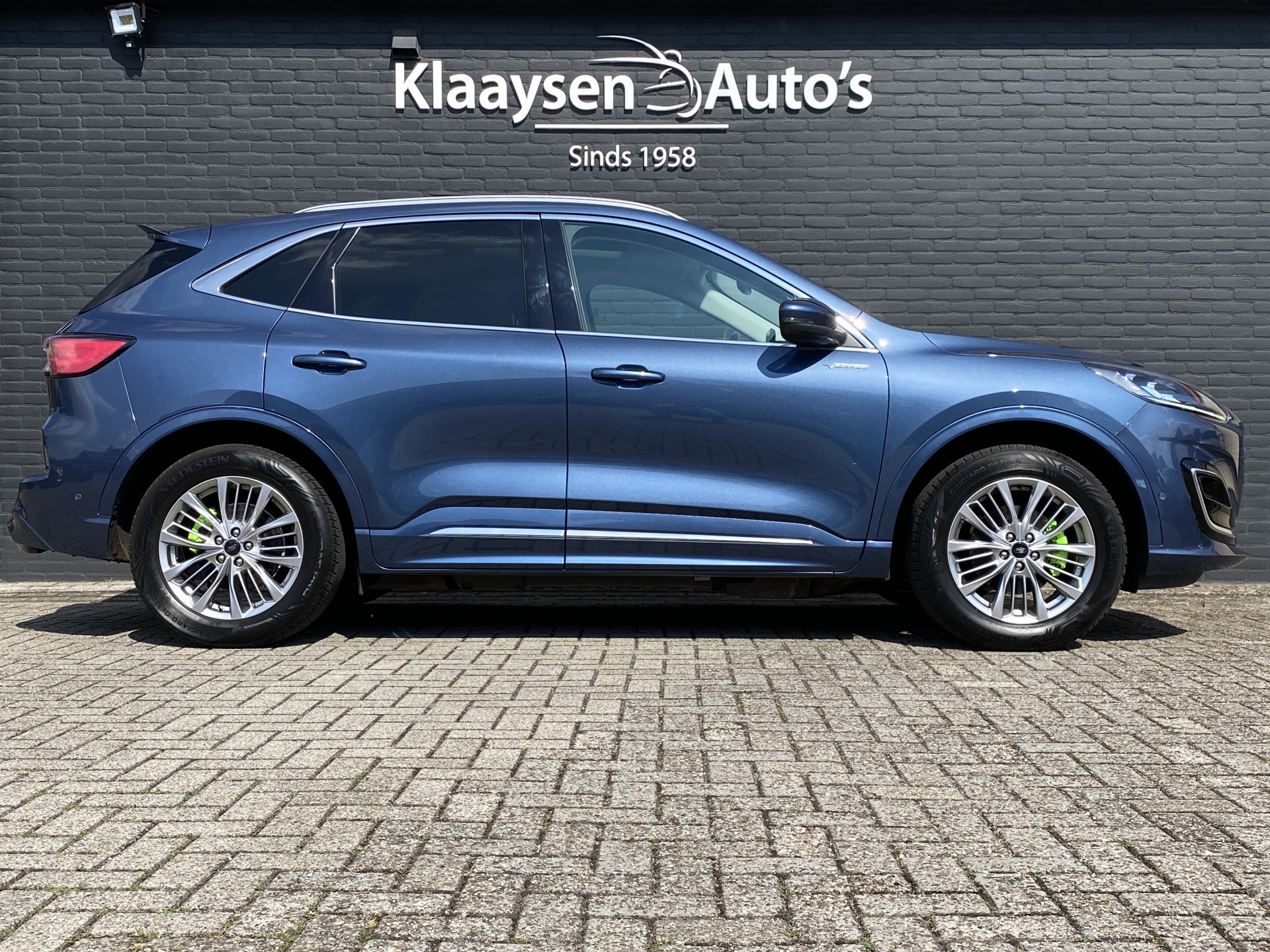 Ford Kuga 2.5 PHEV Vignale 225 pk | dealer onderh. | panoramadak | leder interieur | elektr. v. stoelen | navigatie | B&O audio