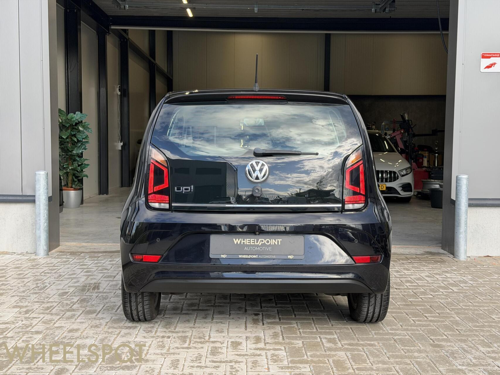 Volkswagen Up! 1.0 BMT high up!|Cruise|Camera|Clima|Stoelver