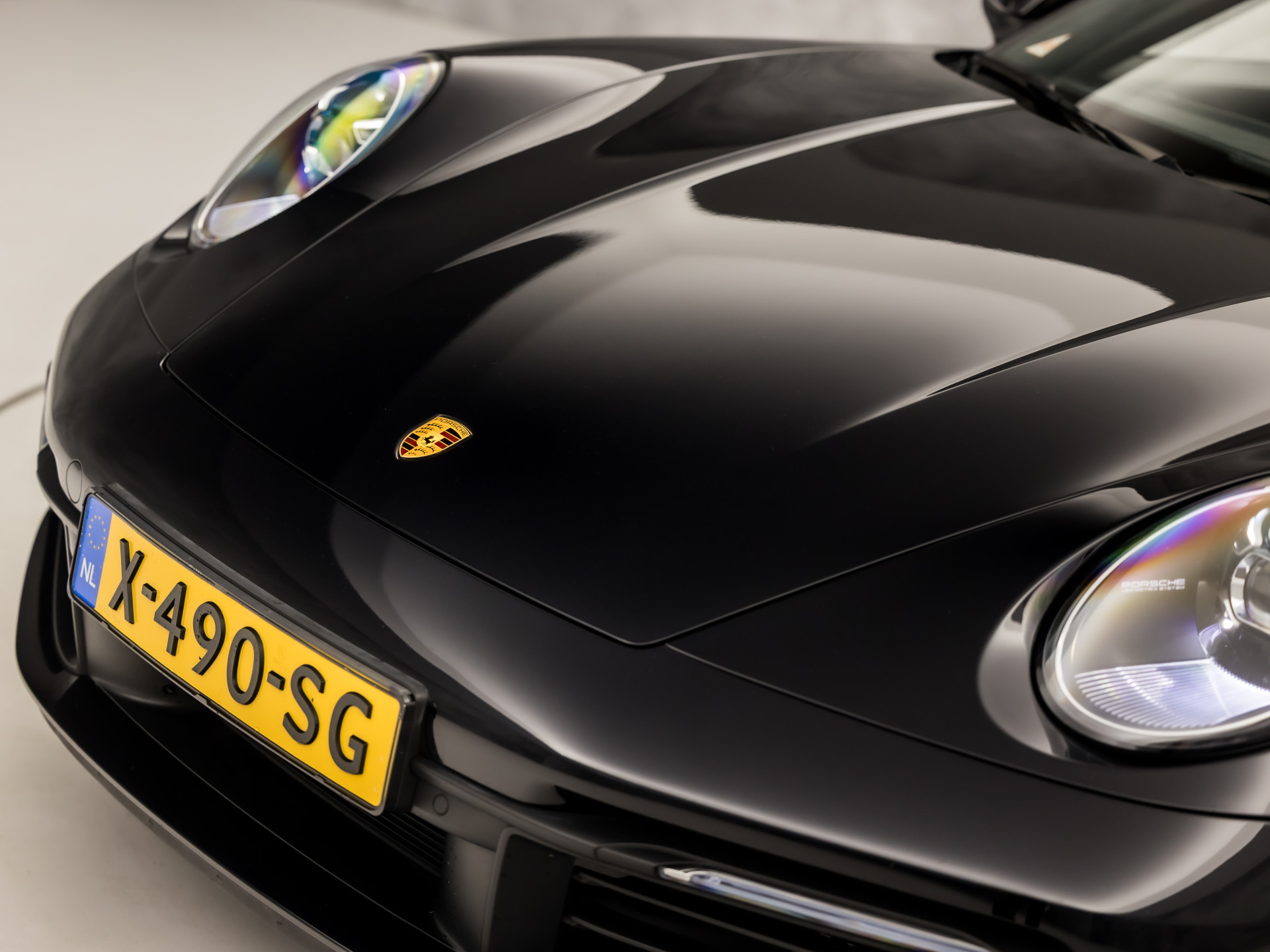 Porsche 911 Cabrio 3.0 Carrera 385Pk (SPORT CHRONO PAKKET, SPORTUITLAAT, BOSE AUDIO, LED MATRIX, APPLE CARPLAY, CAMERA, SFEERVERLICHTING, STOELVERWARMING, NIEUWSTAAT)