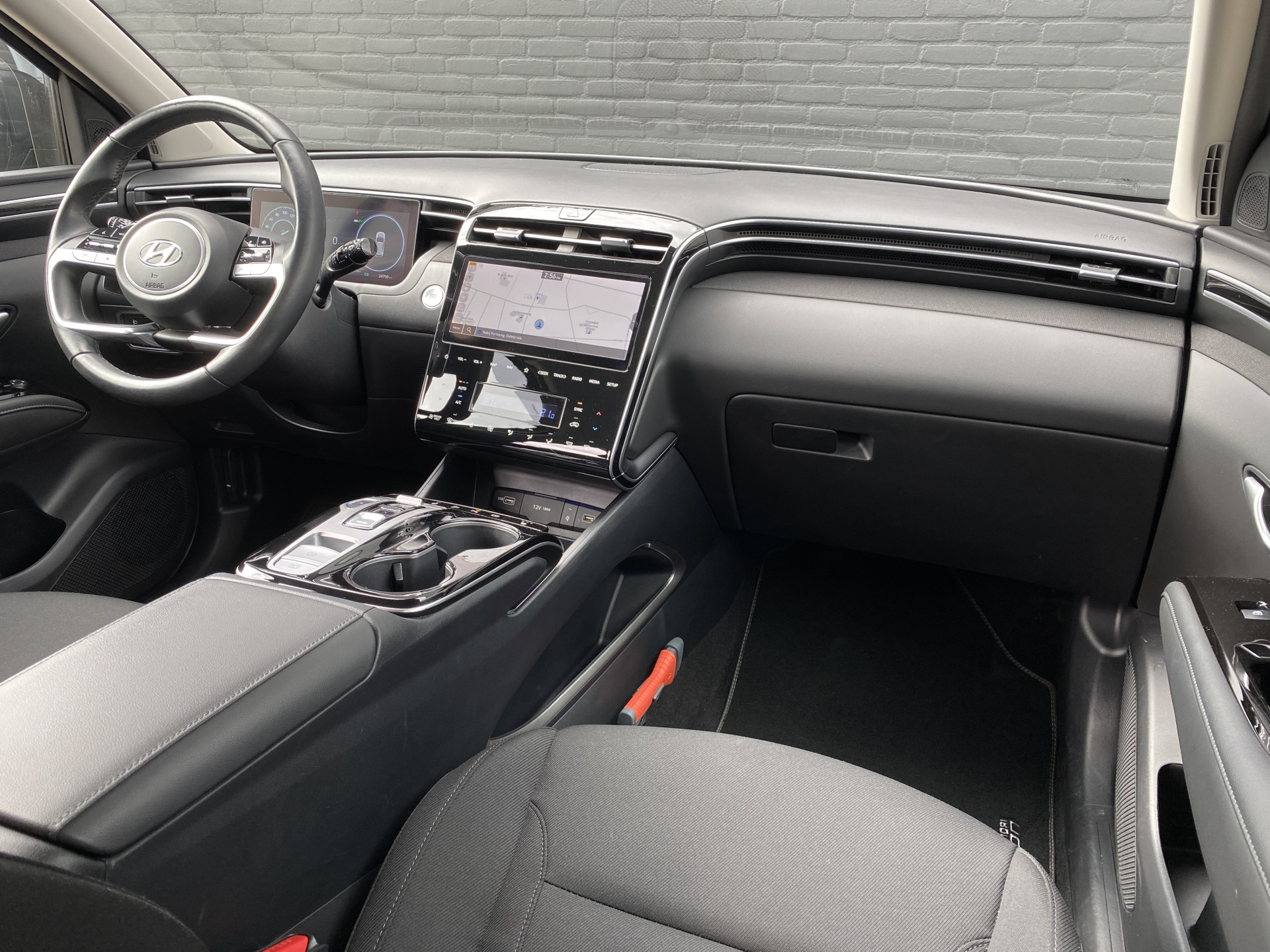 Hyundai Tucson 1.6 T-GDI PHEV 265 pk Comfort Smart 4WD | 1e eigenaar | navigatie | elektr. a. klep | adapt. cruise | camera | BTW auto