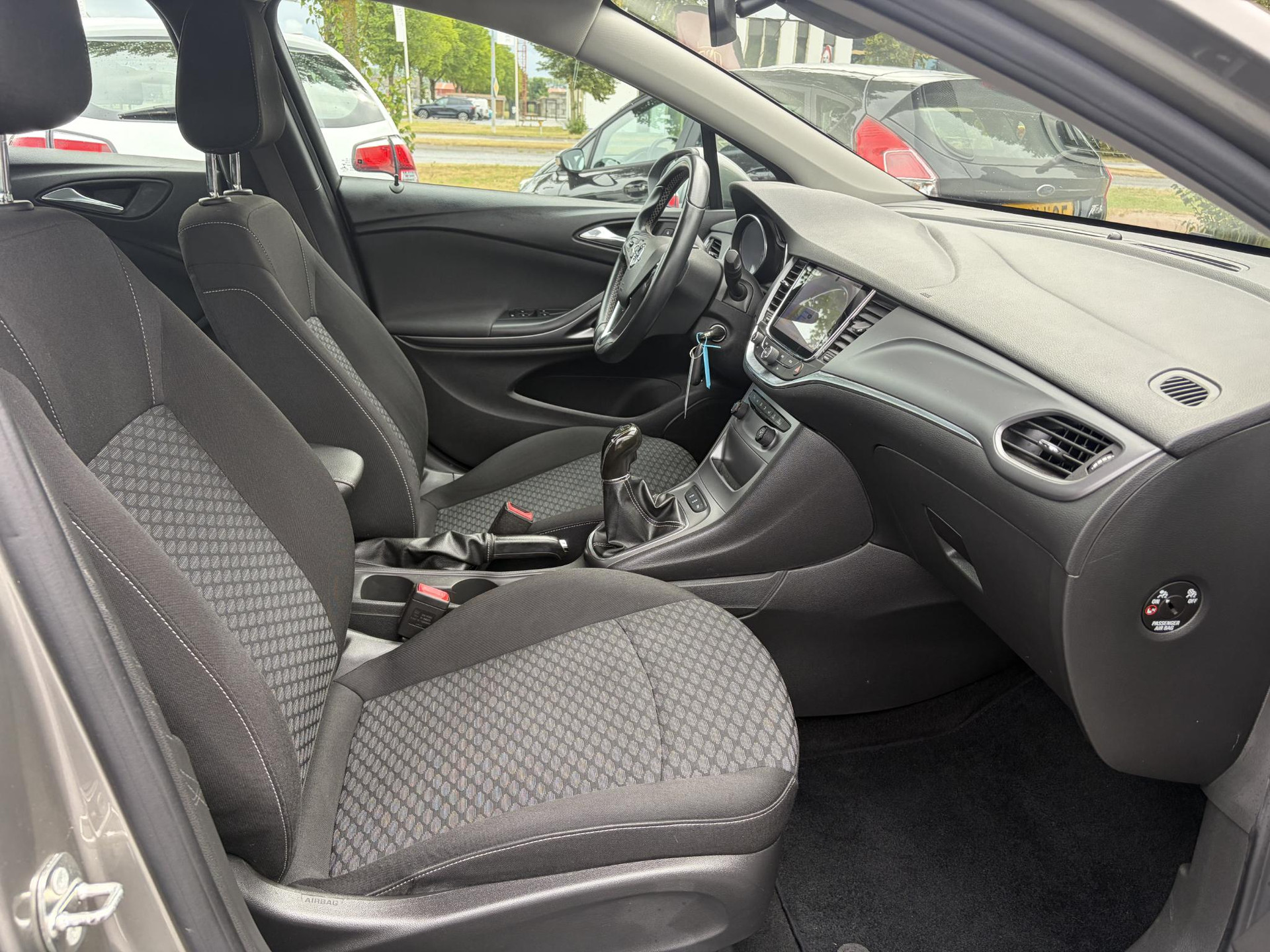 Opel Astra Sports Tourer 1.4 Business+ ✓1e Eigenaar✓Trekhaak✓150pk✓Carplay✓Navi✓Airco✓Cruise✓Pdc V+A✓6 Bak✓Lm velgen✓N.A.P,Apk tot 10-2027