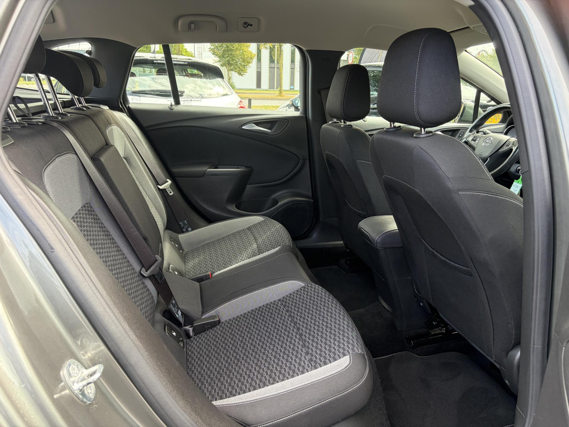 Opel Astra 1.2 Business Edition 147pk l 2e Eigenaar l Trekhaak l Navi l Carplay l 6 Bak l Clima l Cruise l Pdc V+A l Recent beurt gehad l Lm velgen l N.A.P l Apk tot 07-2028