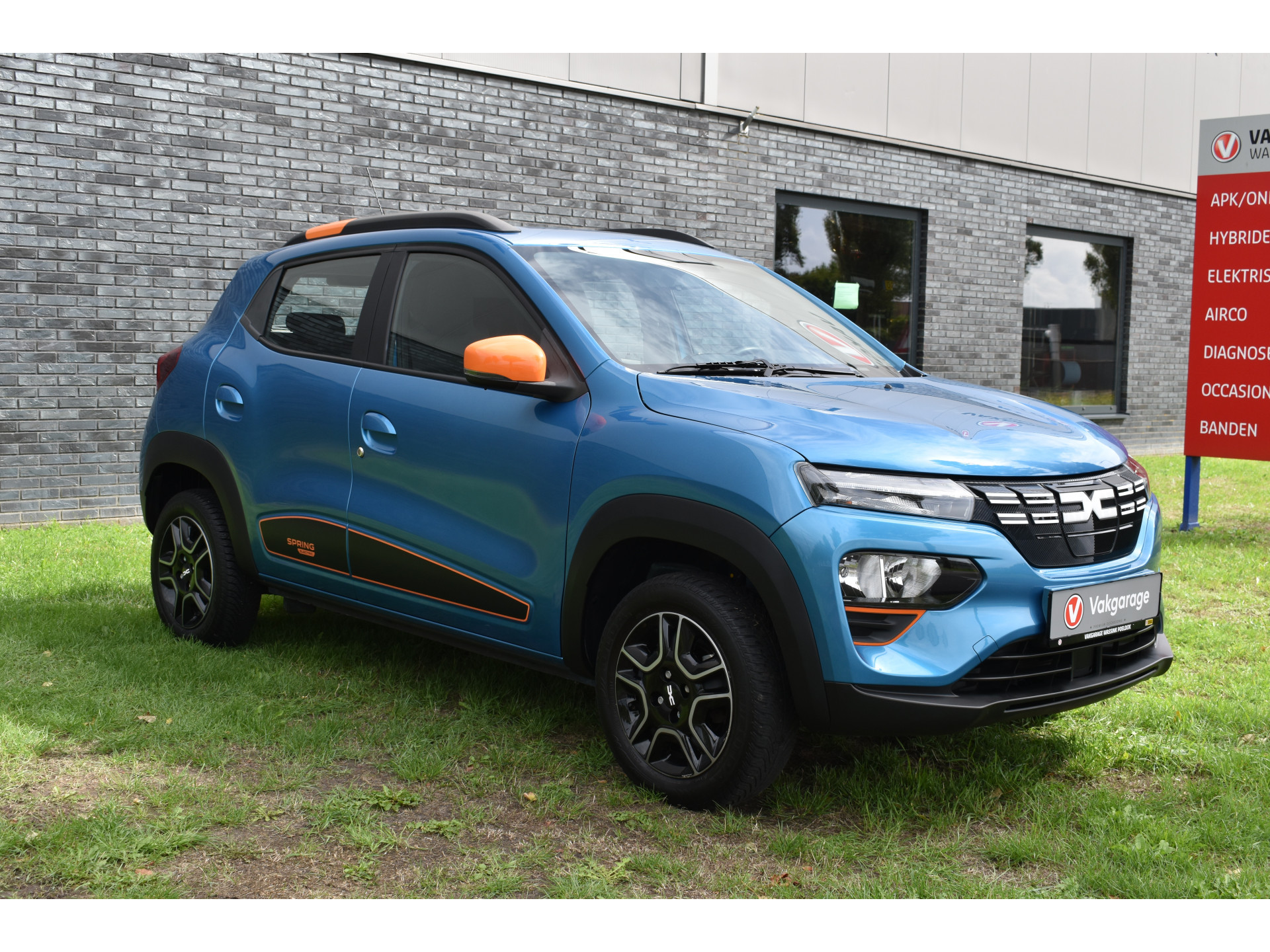 Dacia Spring Essential 27 kWh vol electric navigatie pdc Leer