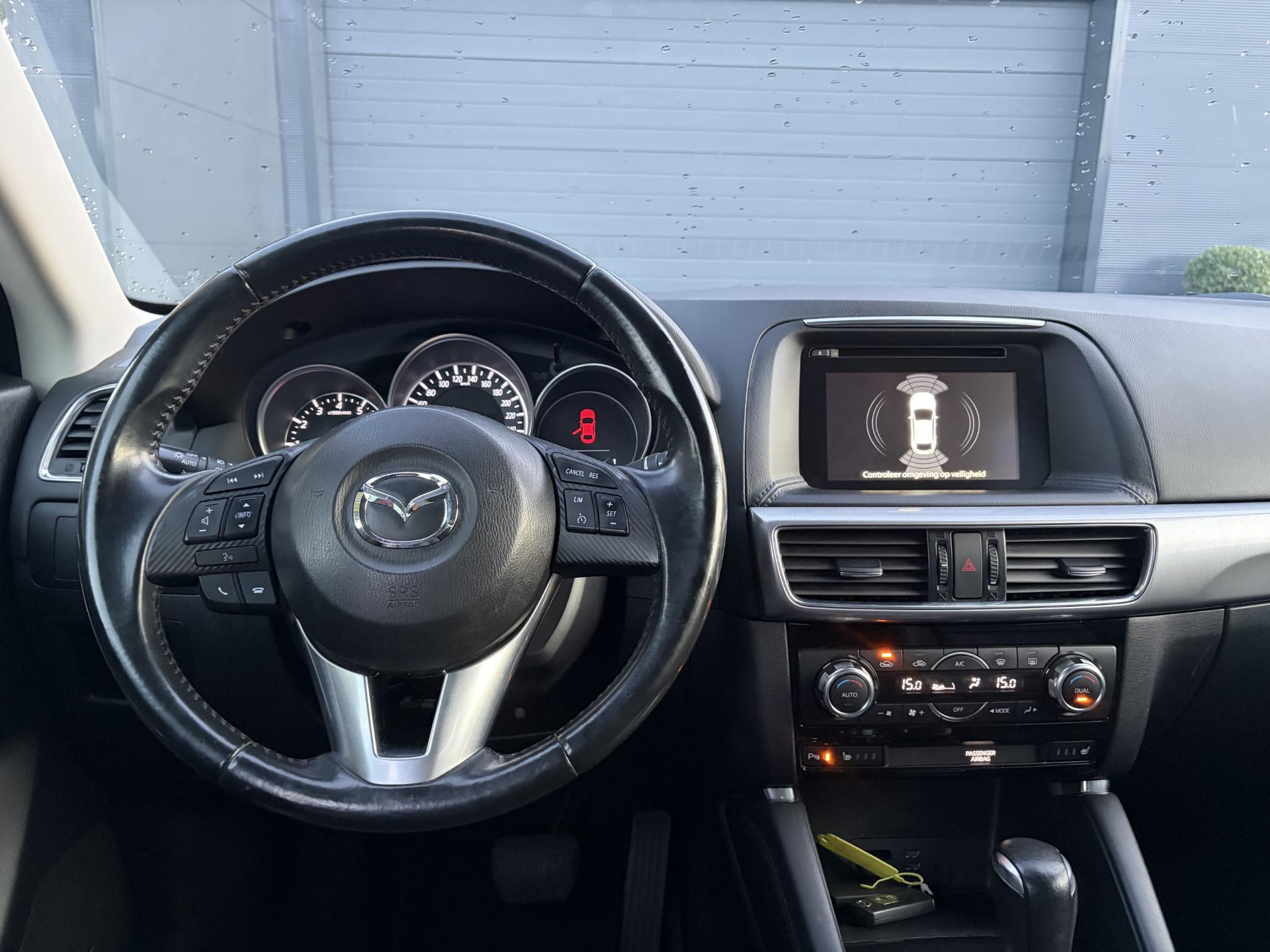 Mazda CX-5 2.0 SkyActiv-G 165 Skylease GT 2WD ✓Recent beurt gehad✓Automaat✓2e Eigenaar✓Camera✓Trekhaak✓Navi✓Leder✓Keyless✓Pdc V+A✓Winterset✓165pk✓Stoelverw✓Elekt Memory Stoelen✓Rijstrooksensor✓Dodehoeksensor✓N.A.P✓Bj 12-2015✓Apk tot 07-2027