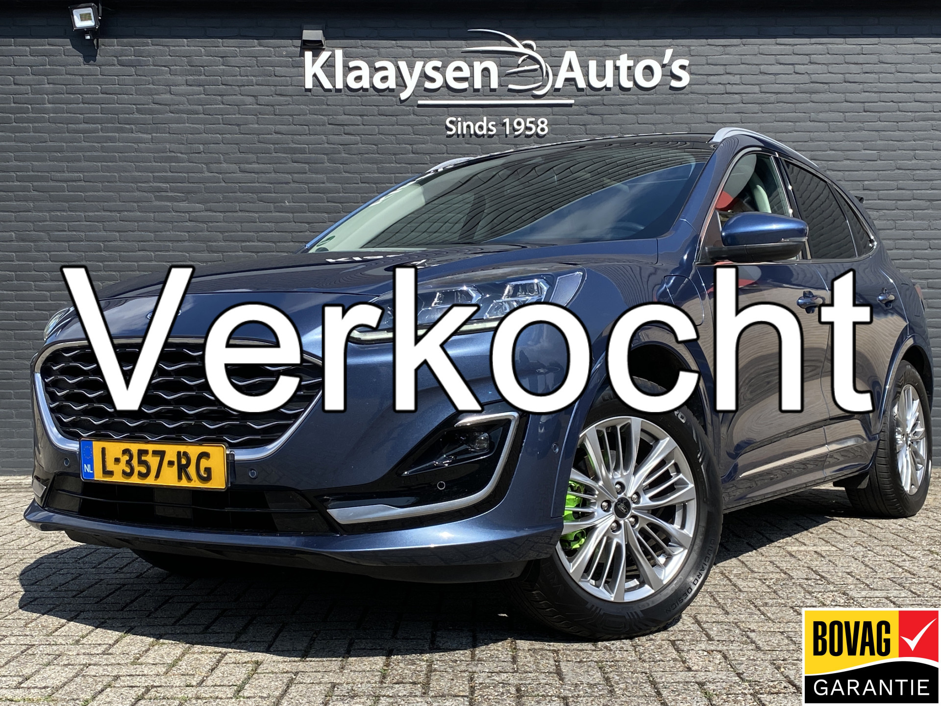 Ford Kuga 2.5 PHEV Vignale 225 pk | dealer onderh. | panoramadak | leder interieur | elektr. v. stoelen | navigatie | B&O audio