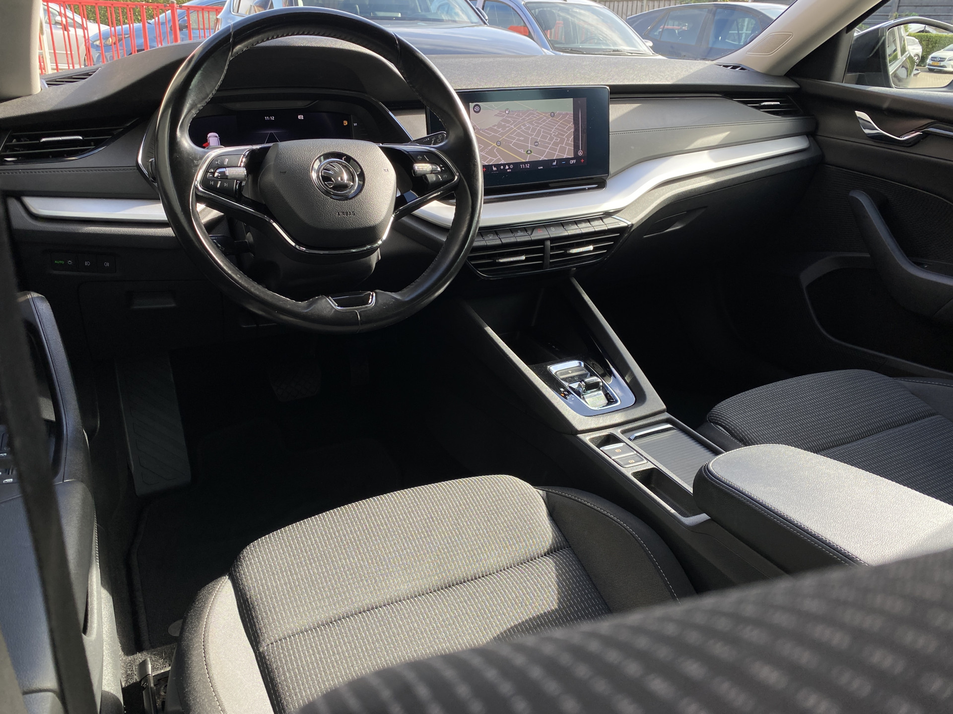ŠKODA Octavia Combi 1.0 e-TSI Business Edition Plus AUT. | 1e eigenaar | dealer onderh. | navigatie | trekhaak | carplay | adaptieve cruise