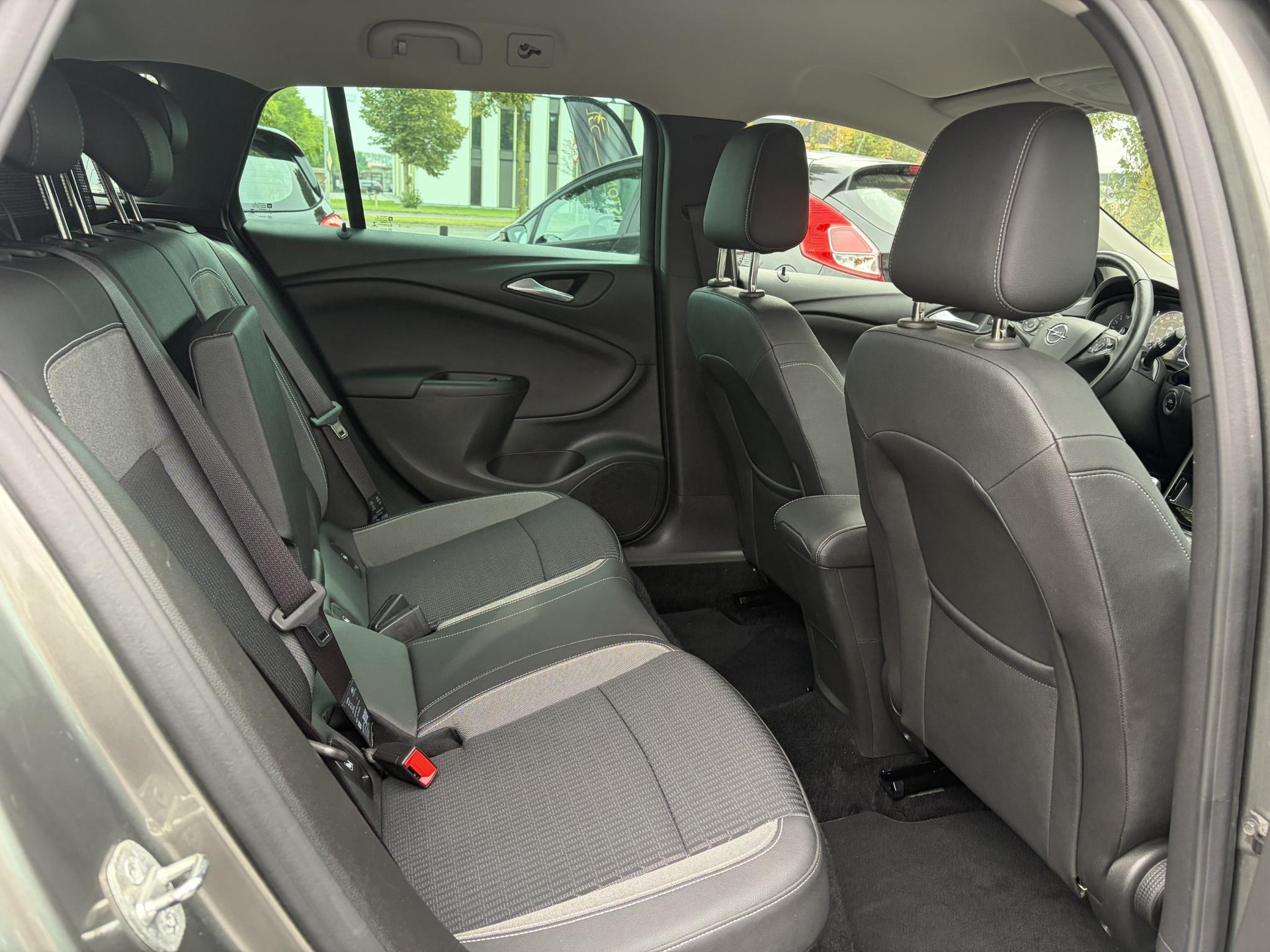 Opel Astra Sports Tourer 1.2 Elegance ✓131pk✓2e Eigenaar✓Camera✓Carplay✓6 Bak✓Stoelverw✓Stuurverw✓Pdc V+A✓Recent beurt gehad✓Clima✓Cruise✓Halfleder✓Keyless✓N.A.P✓Lm velgen✓Rijstrooksensor✓Apk tot 09-2028