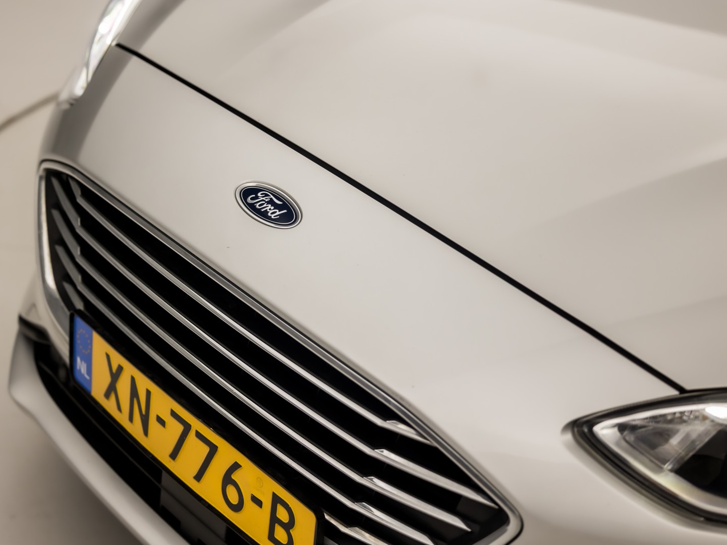 Ford Focus Wagon 1.0 EcoBoost Titanium Sport (APPLE CARPLAY, GROOT NAVI, STUUR/STOELVERWARMING, KEYLESS, SPORTSTOELEN, GETINT GLAS, LM VELGEN, CRUISE, NIEUWSTAAT)