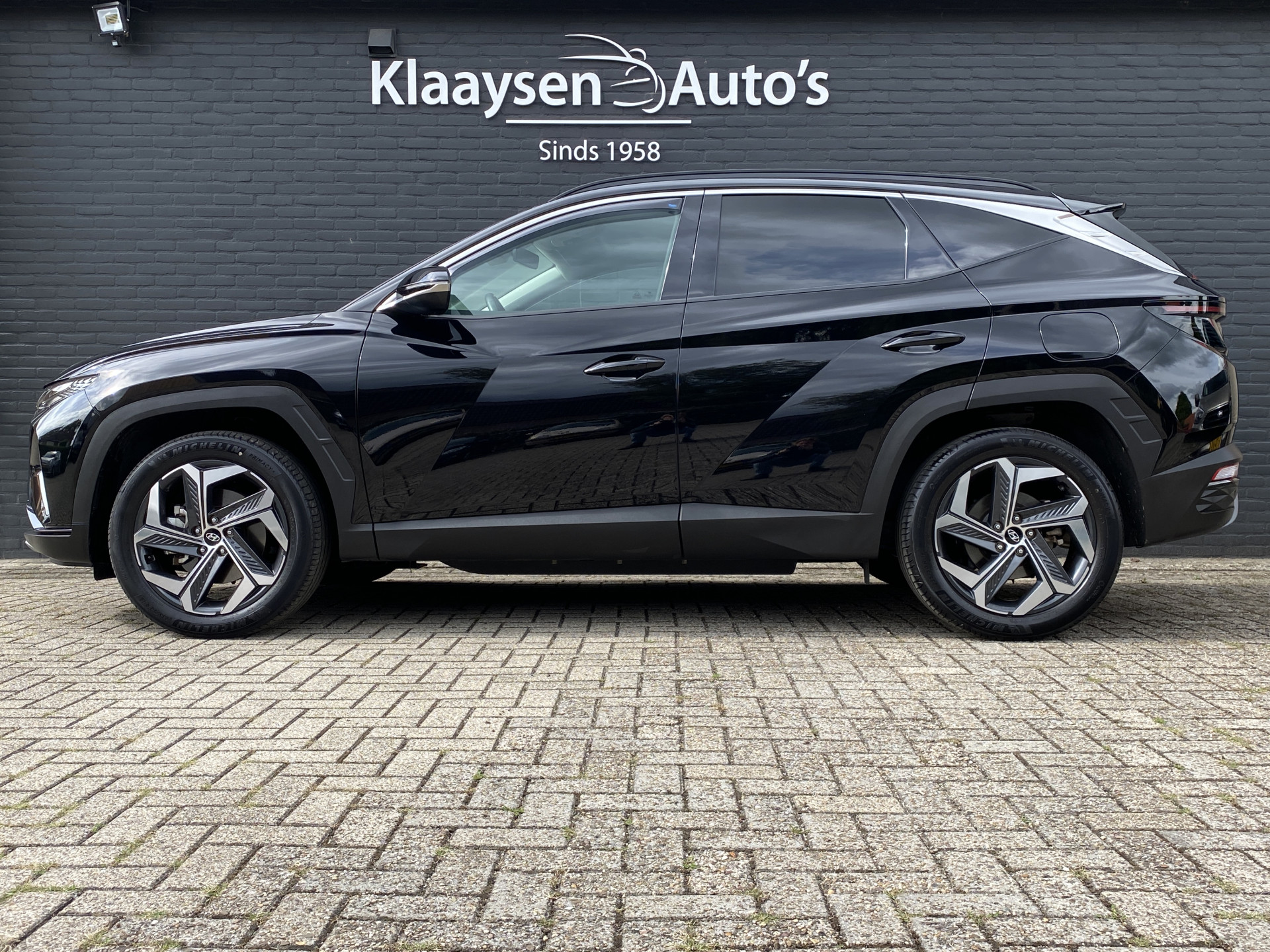 Hyundai Tucson 1.6 T-GDI PHEV 265 pk Comfort Smart 4WD | 1e eigenaar | navigatie | elektr. a. klep | adapt. cruise | camera | BTW auto